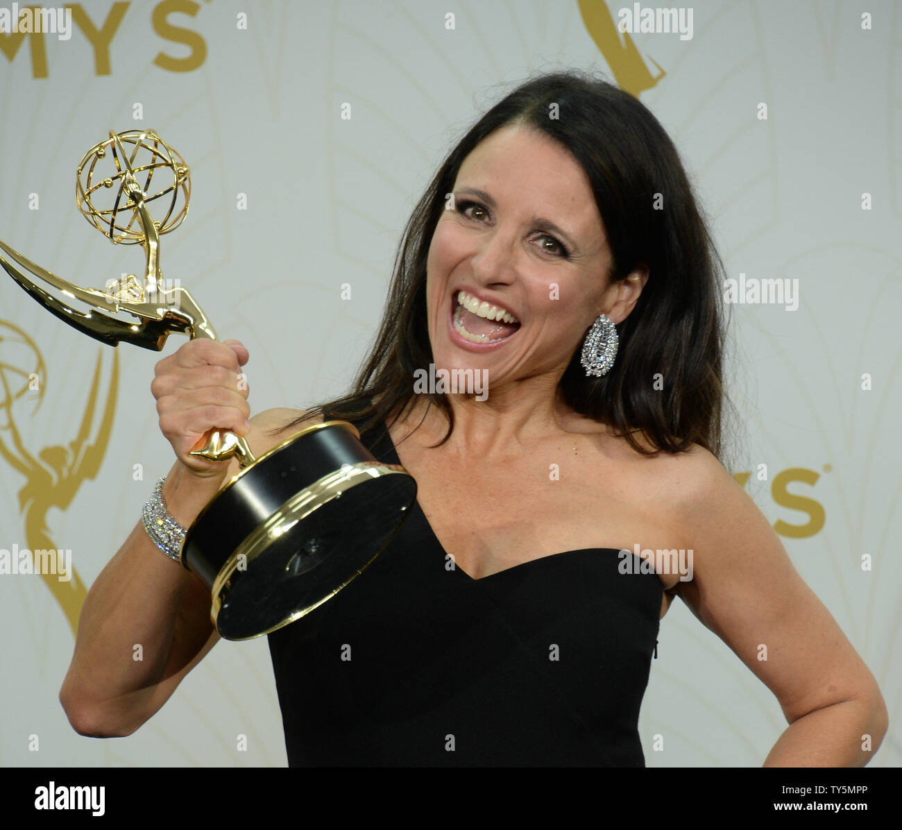 Julia Louis-Dreyfus holds her Emmy Award for outstanding lead actress in a comedy series for her portrayal of Selina Meyer on Veep at the 67th Primetime Emmy Awards in the Microsoft Theater in Los Angeles on September 20, 2015.   Photo by Jim Ruymen/UPI Stock Photo