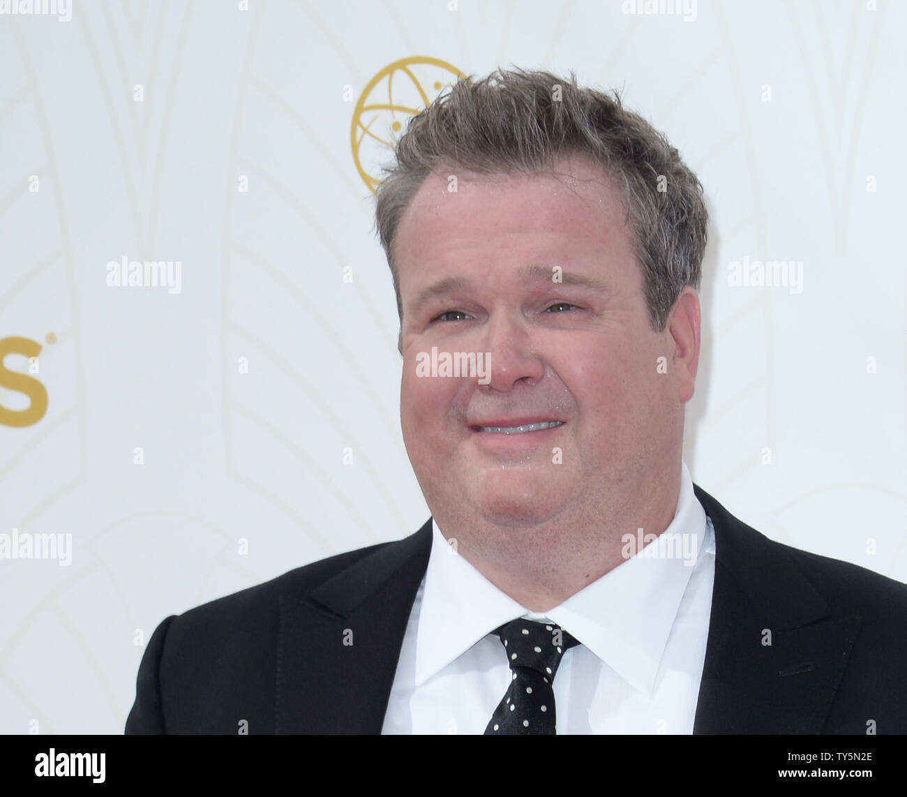 Actor Eric Stonestreet arrives at the 67th Primetime Emmy Awards in the