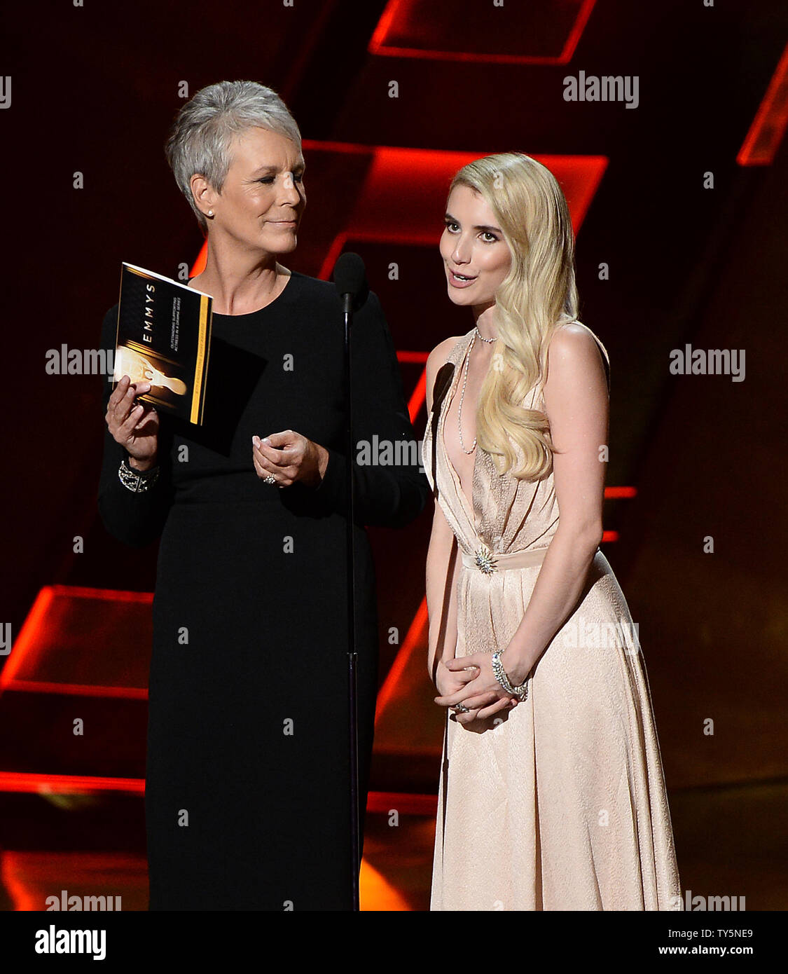 Actresses Jamie Lee Curtis (L) and Emma Roberts appear onstage during
