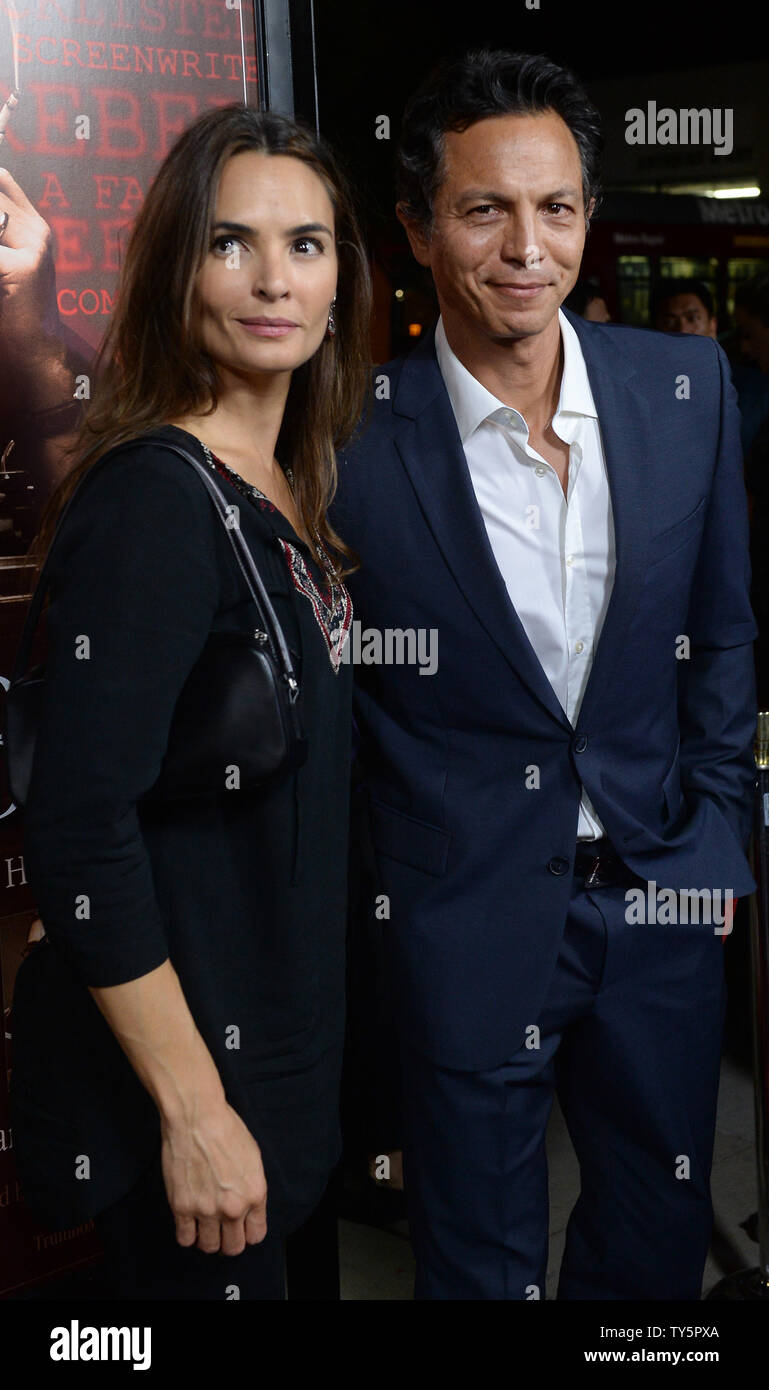 Actor Benjamin Bratt and his wife, actress Talisa Soto attend the premiere of the motion picture biographical drama 'Trumbo' at the Academy of Motion Picture Arts & Sciences in Beverly Hills, California on October 27, 2015. Storyline: In 1947, Dalton Trumbo was Hollywood's top screenwriter until he and other artists were jailed and blacklisted for their political beliefs. The film recounts how Dalton used words and wit to win two Academy Awards and expose the absurdity and injustice under the blacklist, which entangled everyone from gossip columnist Hedda Hopper to John Wayne, Kirk Douglas and Stock Photo