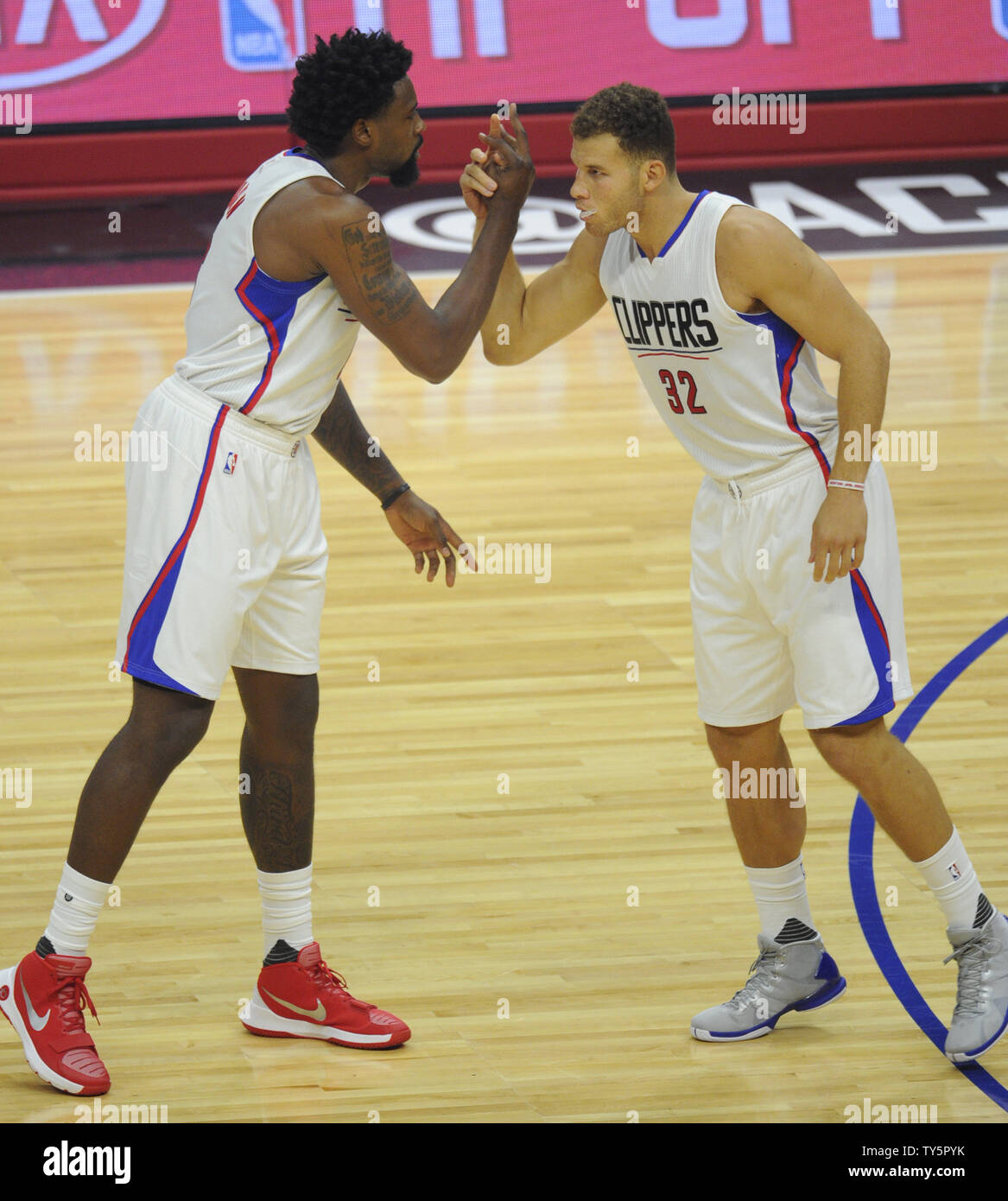 Los Angeles Clippers center DeAndre Jordan (6) hugs Blake Griffin (32) in  the second half of their NBA basketball game against the Los Angeles Lakers  in Los Angeles on December 21, 2011.