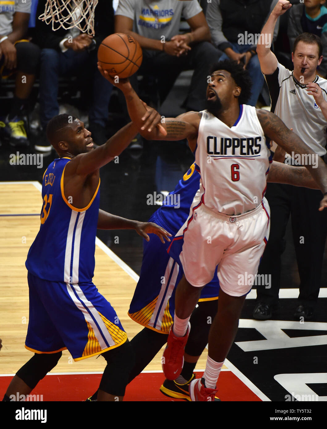 Clippers DeAndre Jordan is hit by Warriors Festus Ezeli in the second half  at Staples Center