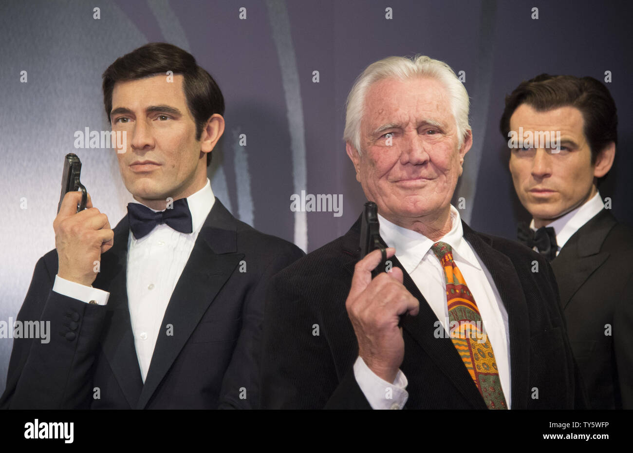 Actor George Lazenby participates in the unveiling of the Wax figures of all six James Bonds now displayed at Madame Tussauds Hollywood in the Hollywood section of Los Angeles on December 15, 2015. Lazenby portrayed Bond in 'On Her MajestyÕs Secret Service' in 1969. The figures represent actors Sean Connery, George Lazenby, Roger Moore, Timothy Dalton, Pierce Brosnan and Daniel Craig in their Bond roles.     Photo by Phil McCarten/UPI Stock Photo
