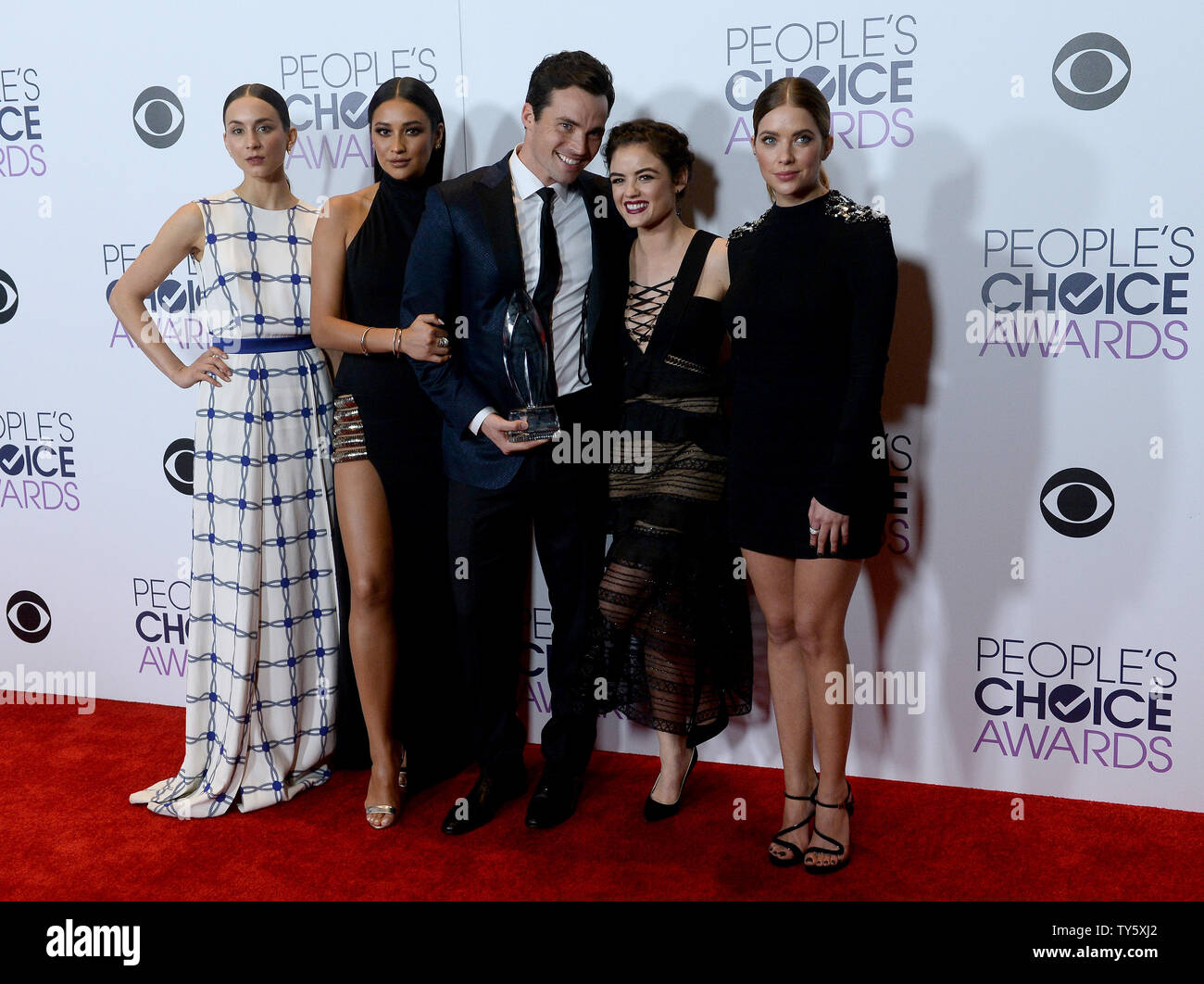 From Left Actors Troian Bellisario Shay Mitchell Ian Harding Lucy Hale And Ashley Benson Appear Backstage With Their Award For Favorite Cable Tv Drama For Pretty Little Liars During The 42nd Annual