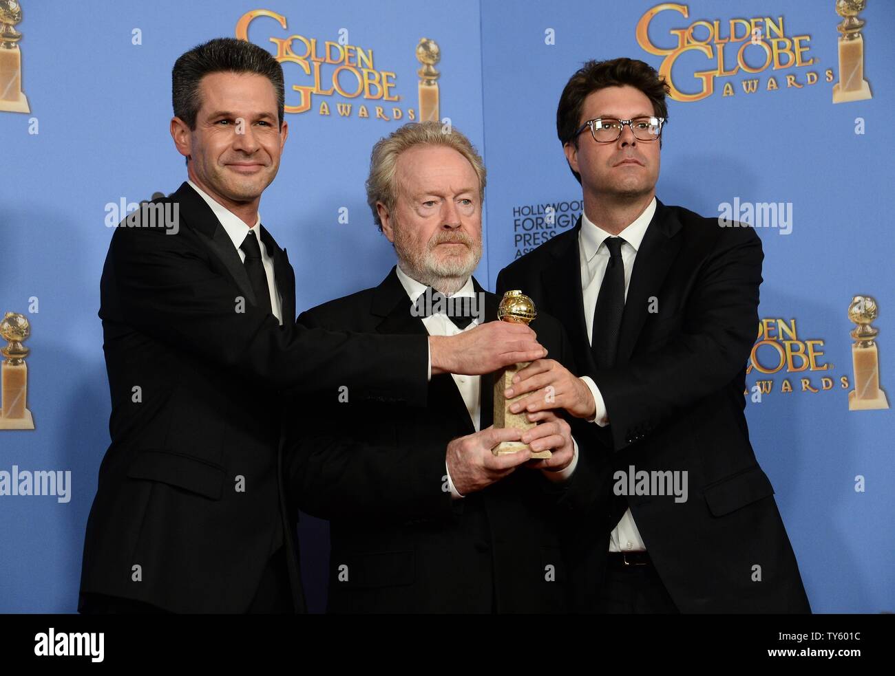 Producer Simon Kinberg, director/producer Ridley Scott and producer Michael Schaefer, winner of the award for Best Motion Picture - Musical or Comedy for 'The Martian' appear backstage during the 73rd annual Golden Globe Awards at the Beverly Hilton Hotel in Beverly Hills, California on January 10, 2016. Photo by Jim Ruymen/UPI Stock Photo