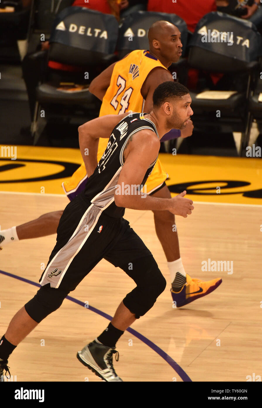 Los Angeles Lakers Kobe Bryant (24) and San Antonio Spurs Tim Duncan sprint up court during first quarter of game at Staples Center in Los Angeles on January 22, 2016. Photo by Jon SooHoo/UPI Stock Photo