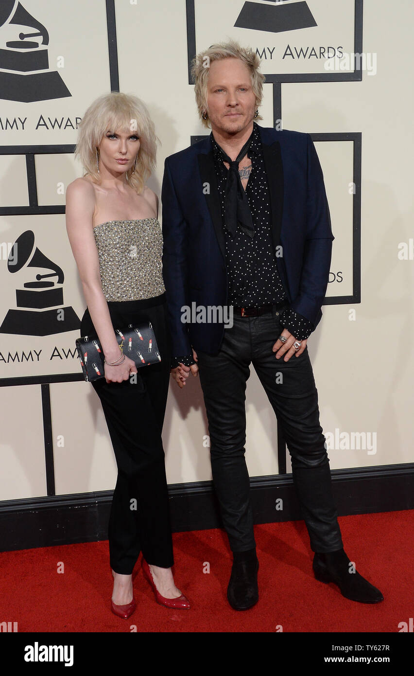 Matt Sorum, right, and guest arrive for the 58th annual Grammy Awards ...
