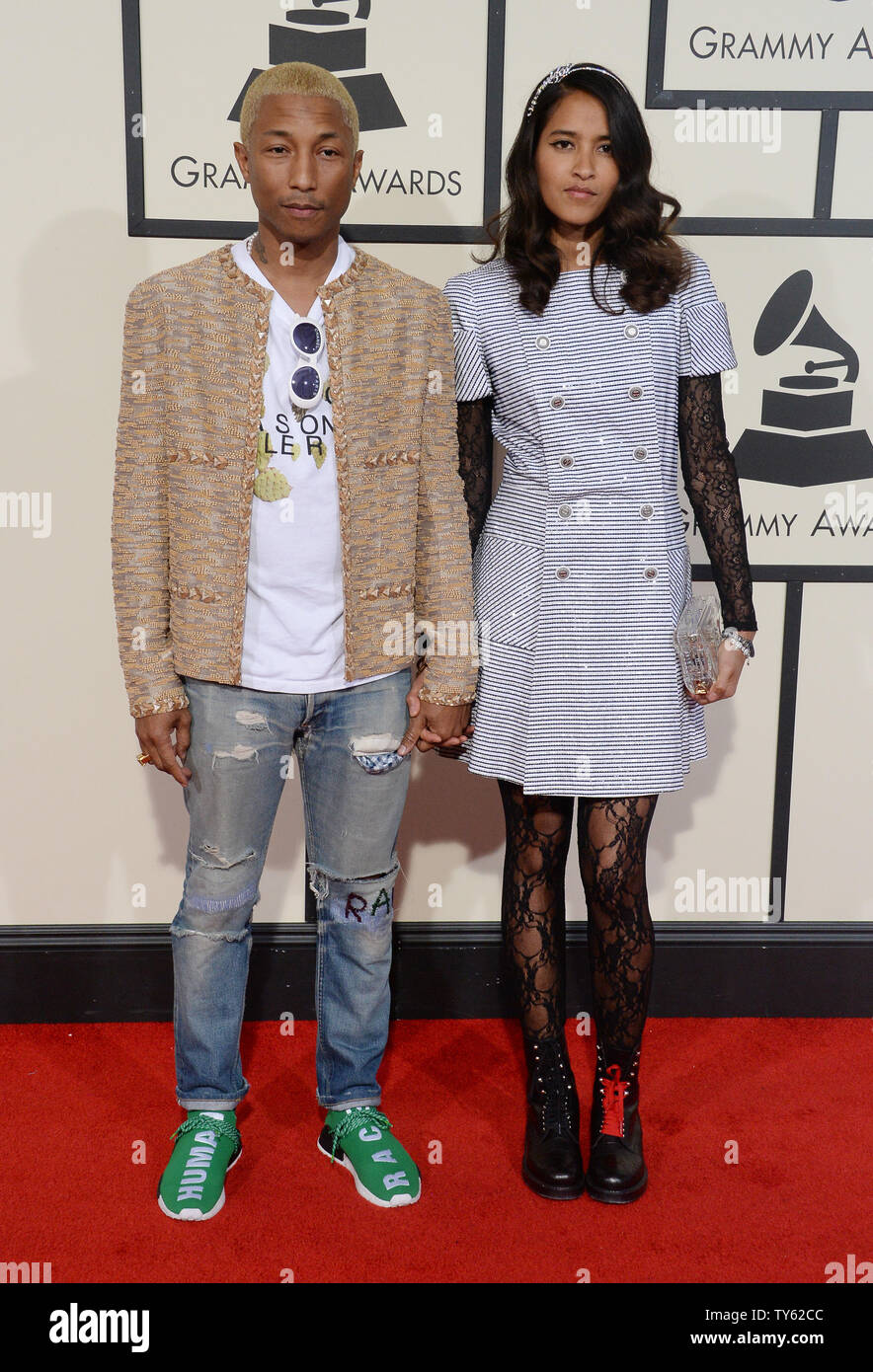LOS ANGELES, CA. February 15, 2016: Pharrell Williams & wife Helen  Lasichanh at the 58th Annual Grammy Awards at the Nokia Theatre LA Live. ©  2016 Paul Smith / Featureflash Stock Photo - Alamy