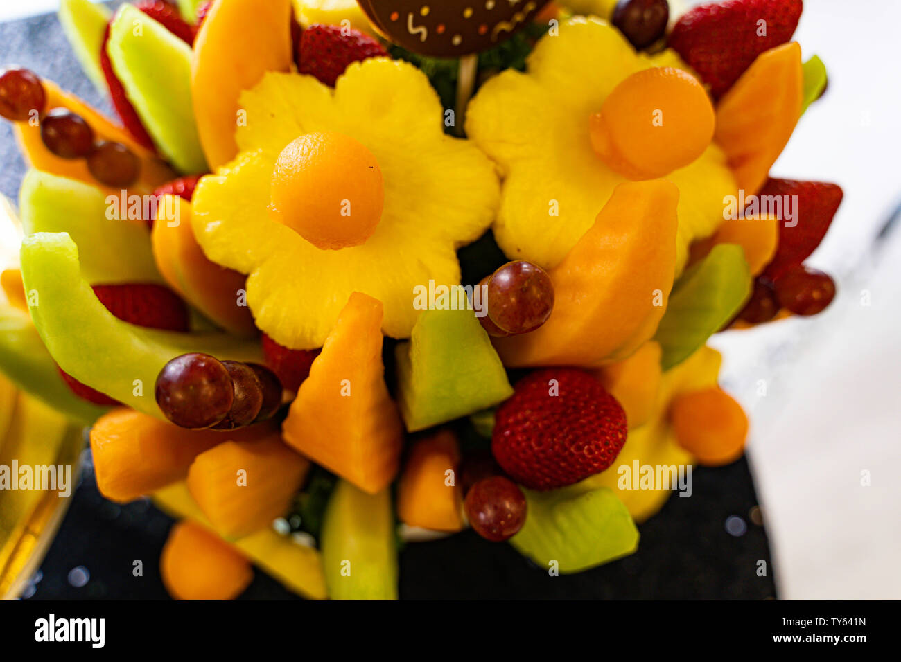 Edible Fruit basket arrangement with a variety of fruits Stock Photo
