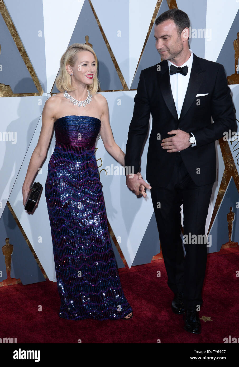 Actors Naomi Watts (L) and Liev Schreiber arrive on the red carpet for