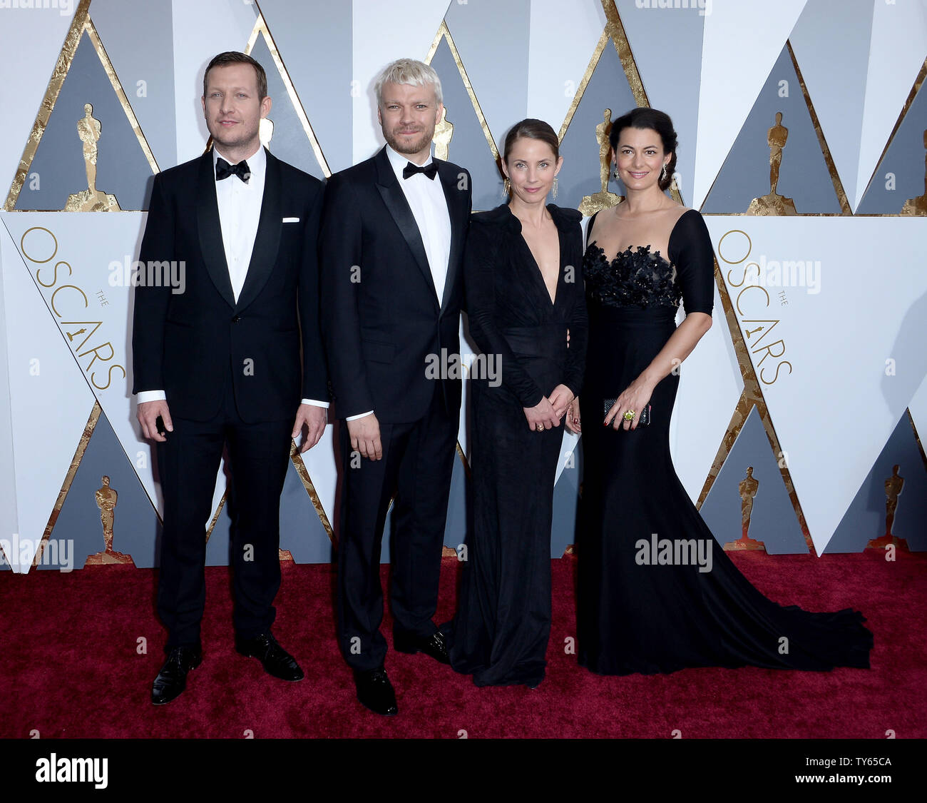 From left, filmmaker Tobias Lindholm and actors Pilou Asbaek, Tuva Novotny and Caroline Blanco arrive on the red carpet for the 88th Academy Awards, at the Hollywood and Highland Center in the Hollywood section of Los Angeles on February 28, 2016.  Photo by Jim Ruymen/UPI Stock Photo