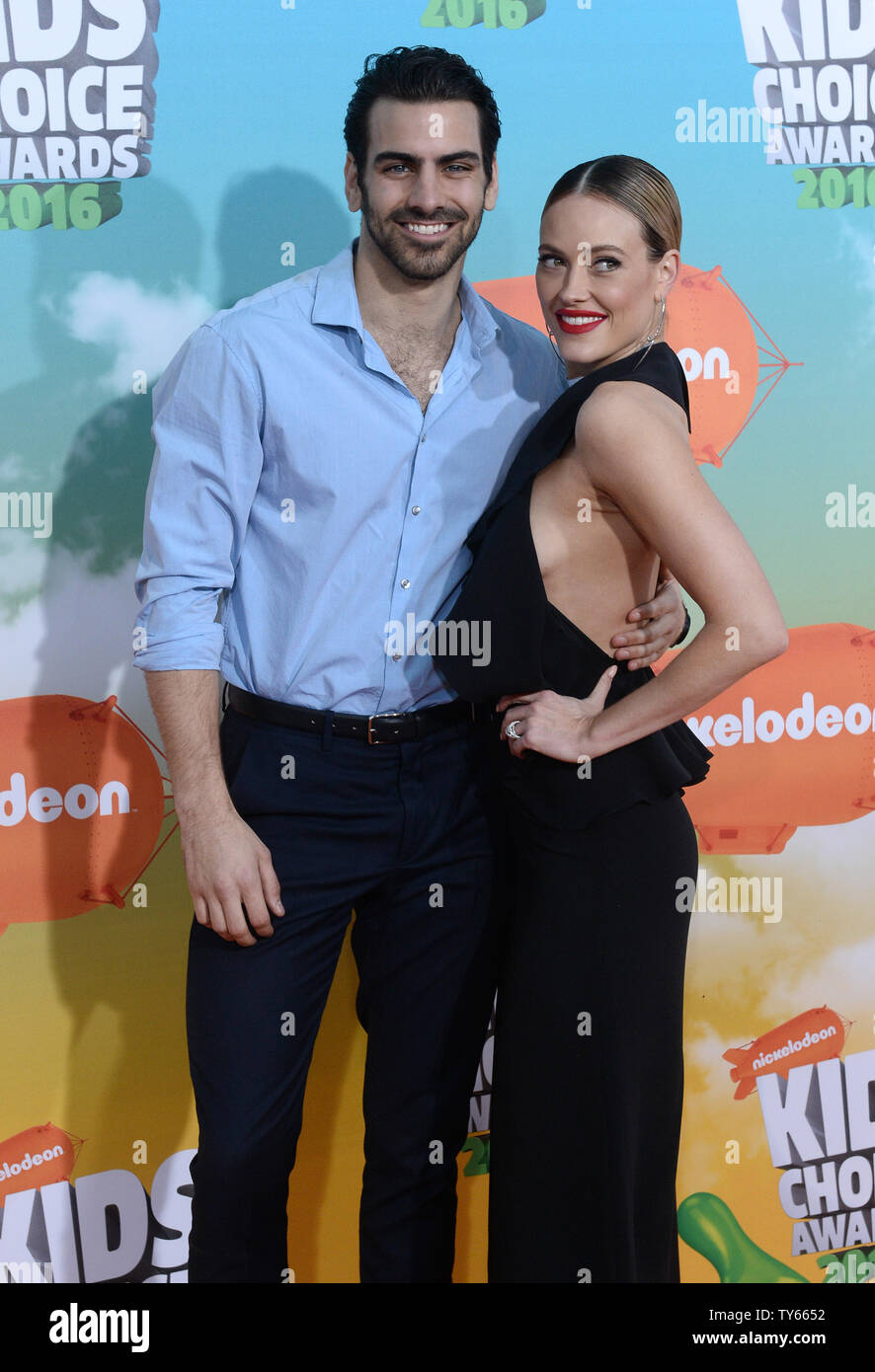 Model Nyle DiMarco (L) and dancer Peta Murgatroyd attend Nickelodeon's