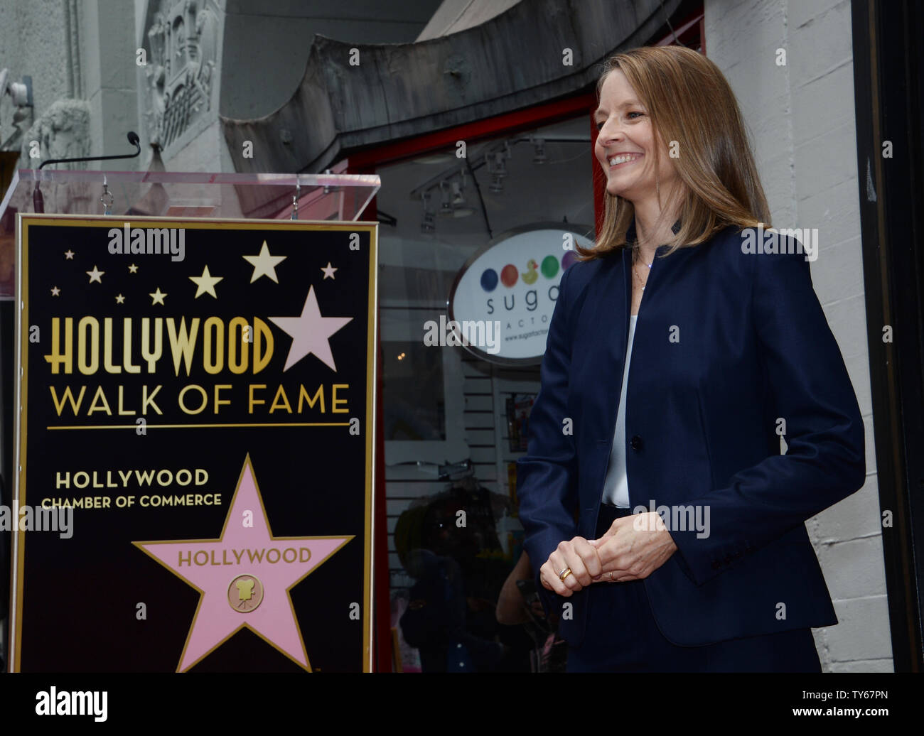 Actress Jodie Foster (R) poses for photographers during an unveiling ...