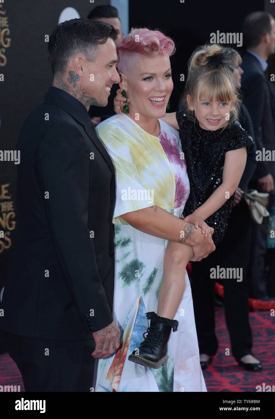 Singer and songwriter Pink, aka Alecia Moore, her husband, motorcycle racer Carey Hart and their daughter Willow Sage Hart attend the premiere of the motion picture fantasy 'Alice Through the Looking Glass' at the El Capitan Theatre in the Hollywood section of Los Angeles on May 23, 2016. Storyline: Nineteen-year-old Alice returns to the magical world from her childhood adventure, where she reunites with her old friends and learns of her true destiny: to end the Red Queen's reign of terror.  Photo by Jim Ruymen/UPI Stock Photo