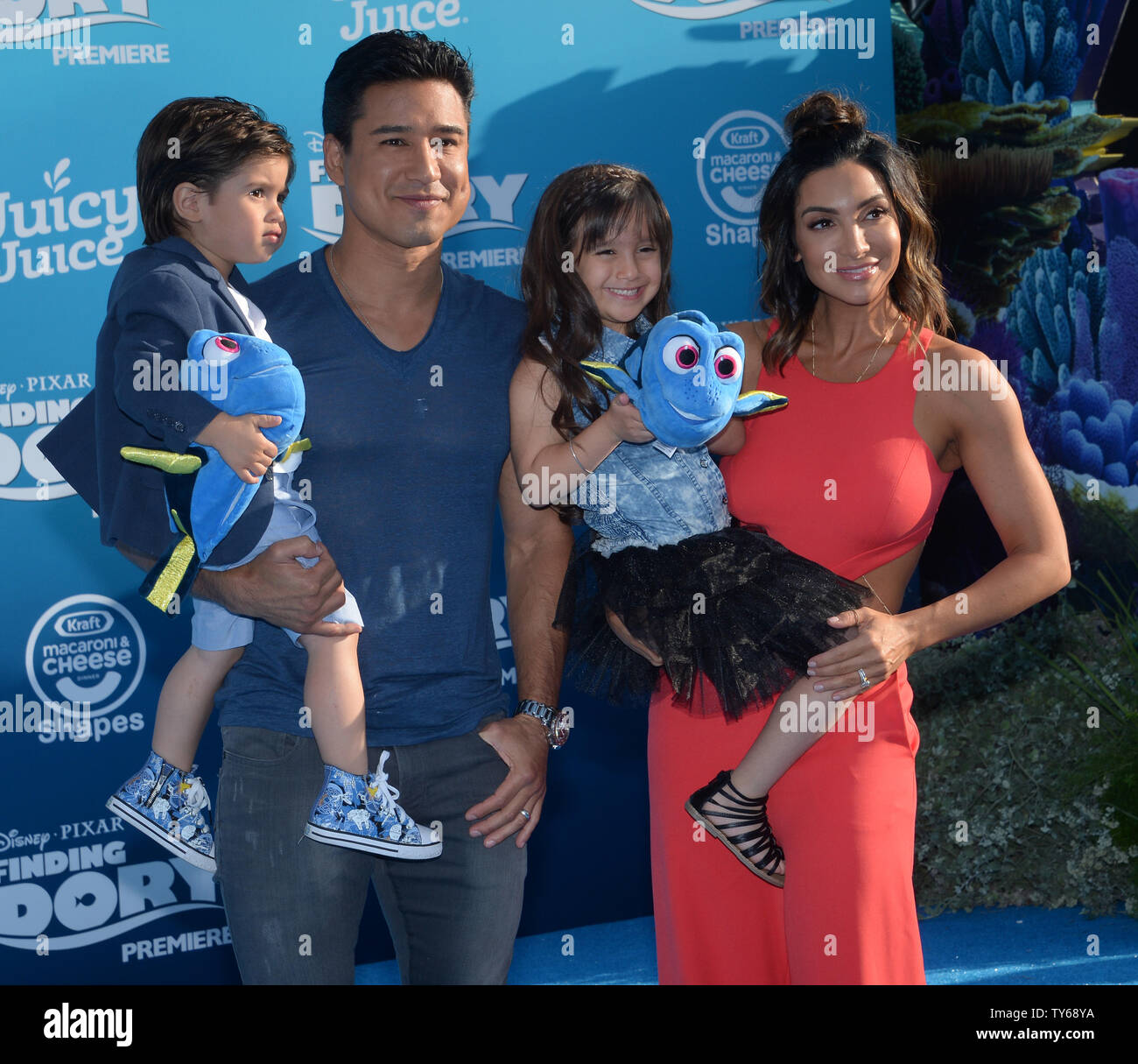 TV host Mario Lopez and his wife Courtney Mazza and their son son
