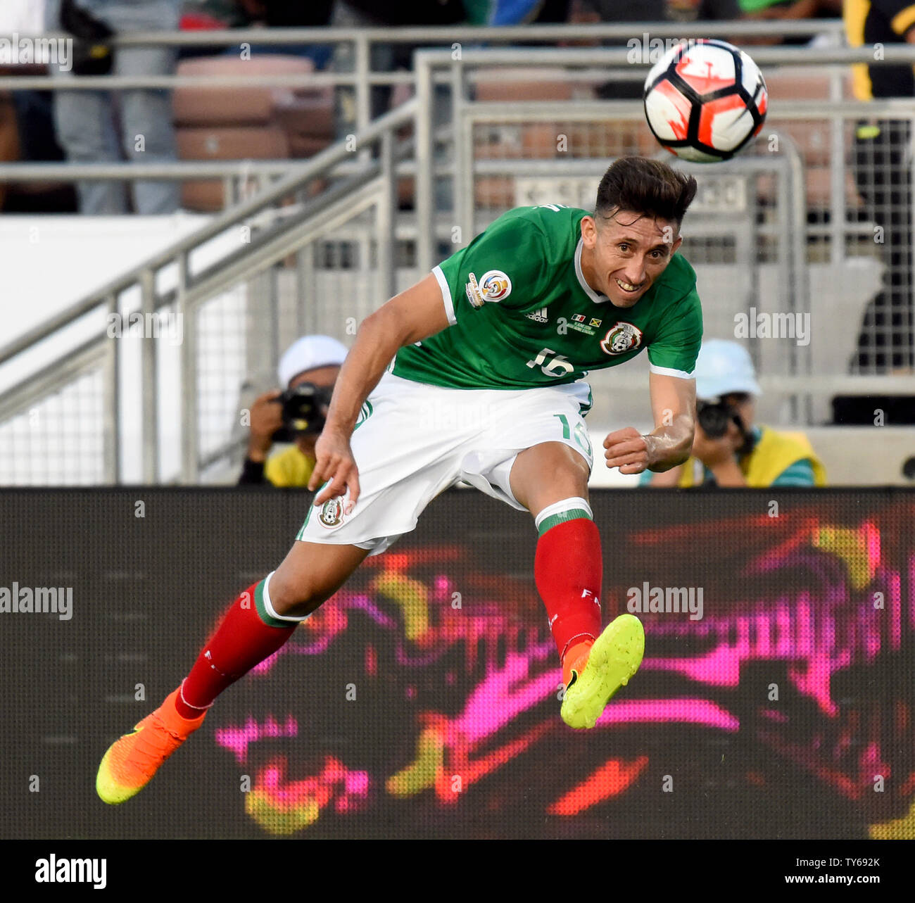 Mexico midfielder Héctor Herrera kicks a long pass against Jamaica during the first half of a 2016 Copa America Centenario Group A match at the Rose Bowl in Pasadena, California, on June 9, 2016.      Photo by Michael Owen Baker/UPI Stock Photo