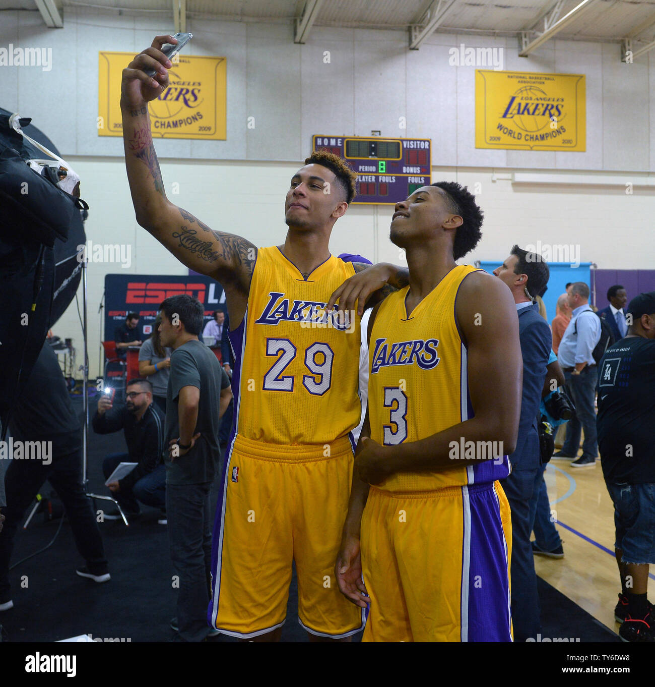 Los Angeles Lakers' Zach Auguste (29) and Anthony Brown (3) participate
