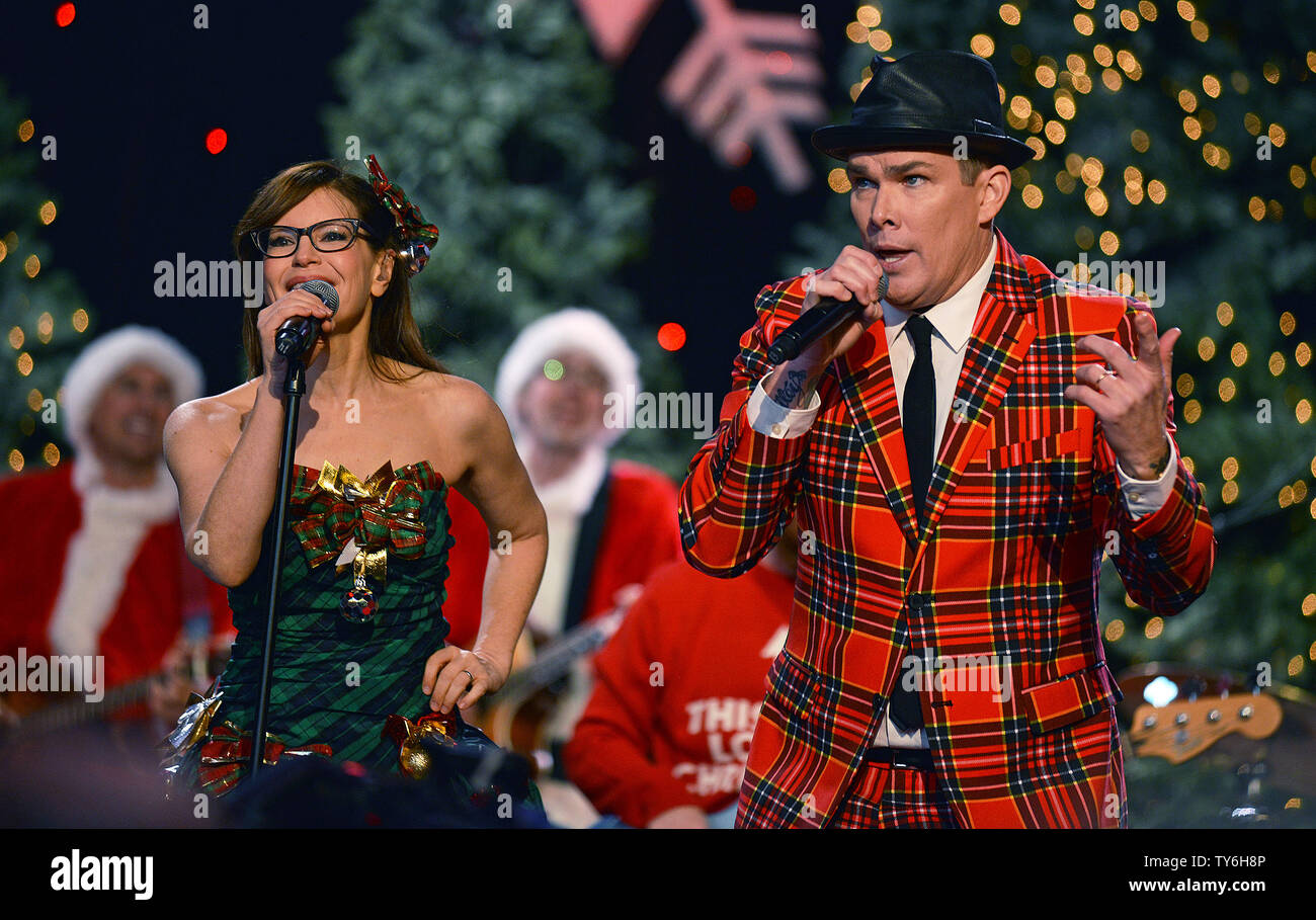 Singers Mark McGrath (R) and Lisa Loeb perform with the Band of Merrymakers at the All-Star Concert at the 85th Annual Hollywood Christmas Parade on Hollywood Boulevard in Los Angeles, California on November 27, 2016. Photo by Christine Chew/UPI Stock Photo