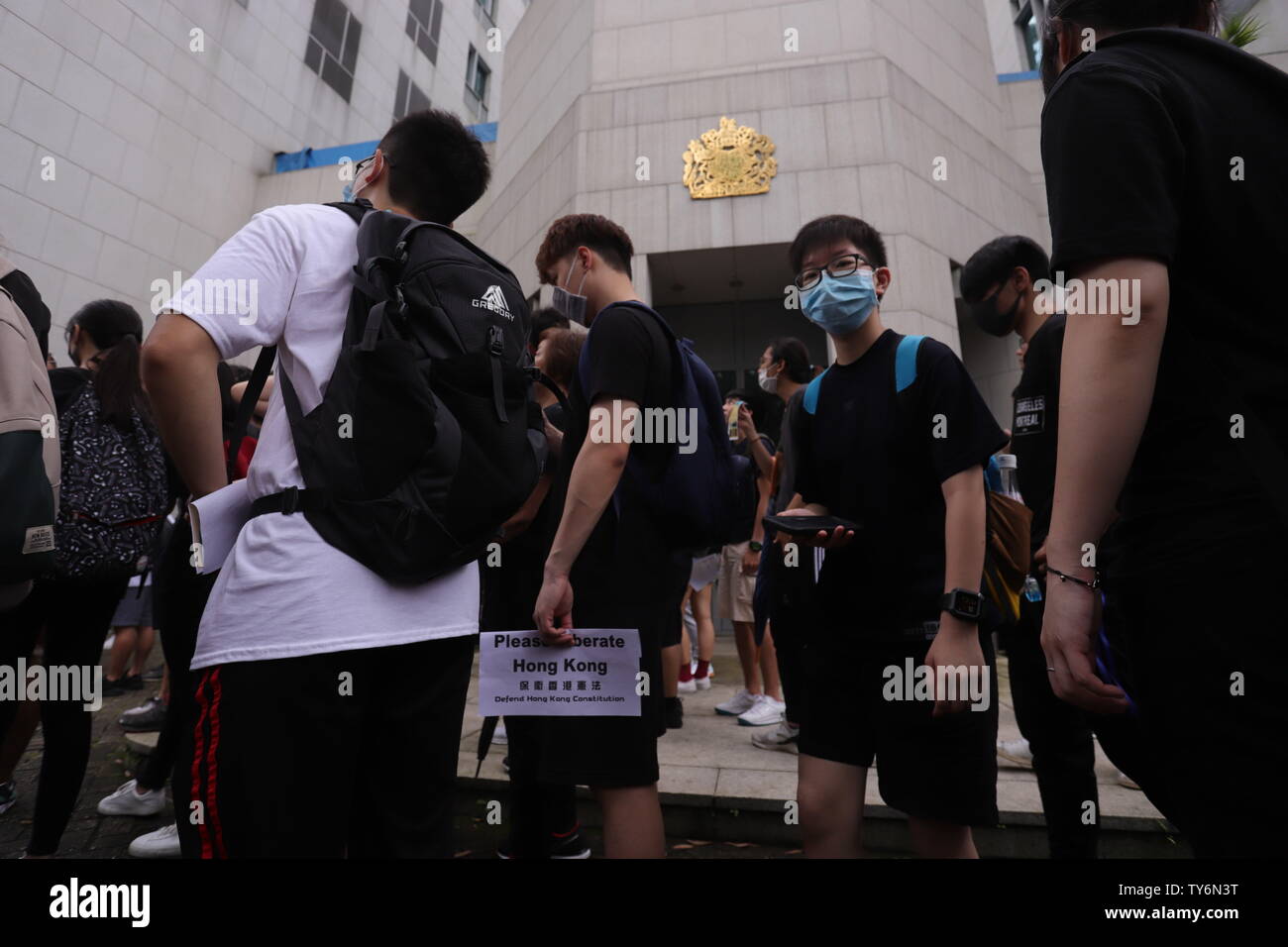 Hong Kong. 26th June, 2019. Petitioners stand outside BRITISH LIAISON OFFICE IN HONG KONG.Hundreds of citizens staged a marathon petitions at the foreign consulate general offices this morning asking Western Governments to exert political pressure against China over controversial legislature of Extradition Bill on the eve of G20 Summit in Japan.June-26, 2019 Hong Kong.ZUMA/Liau Chung-ren Credit: Liau Chung-ren/ZUMA Wire/Alamy Live News Stock Photo