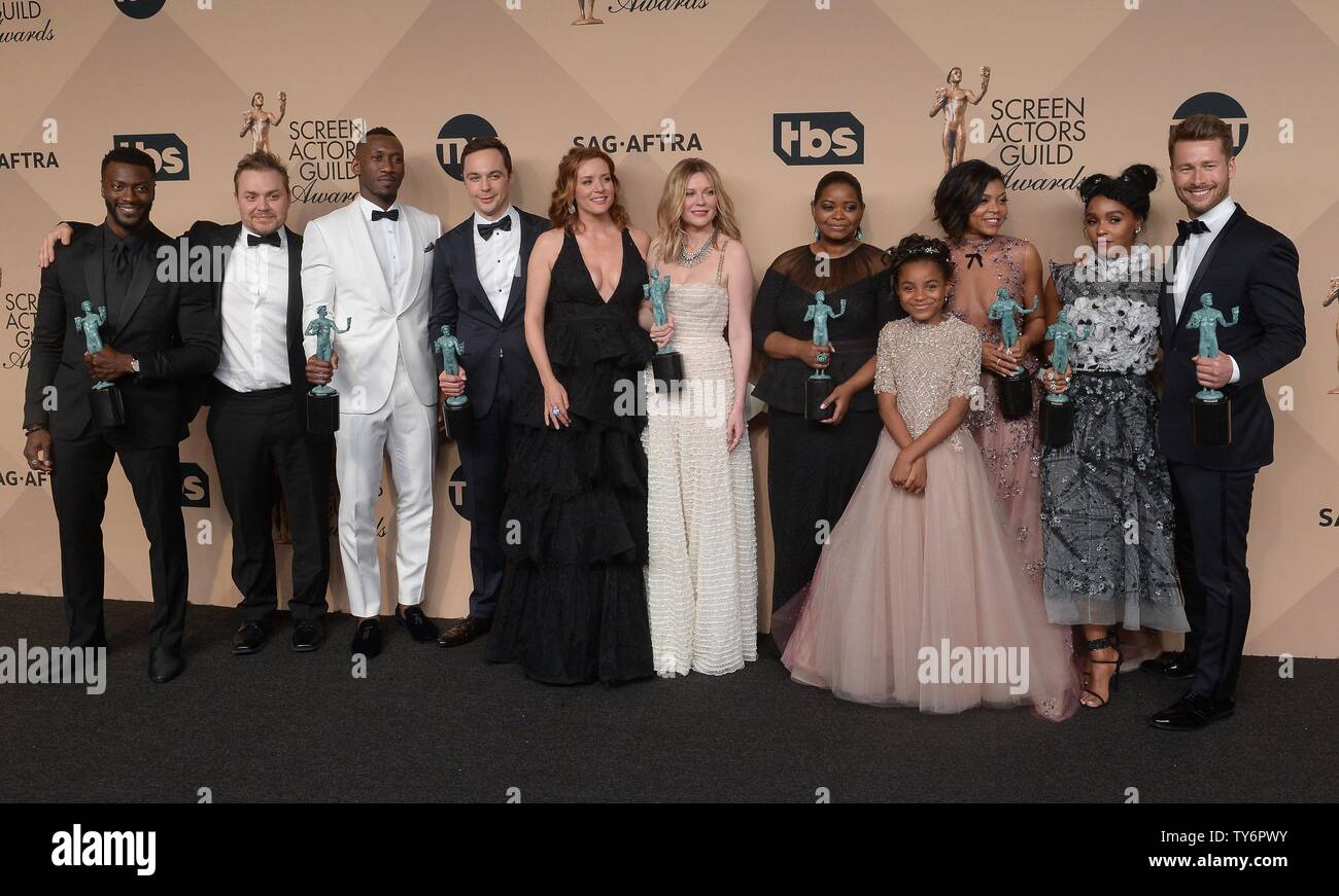(L-R) Aldis Hodge, Theodore Melfi, Mahershala Ali, Jim Parsons, Kimberly Quinn, Kirsten Dunst, Octavia Spencer, Saniyya Sidney, Taraji P. Henson, Janelle Monae and Glen Powell appear backstage with their award for Outstanding Performance by a Cast in a Motion Picture for 'Hidden Figures' during the the 23rd annual SAG Awards held at the Shrine Auditorium in Los Angeles on January 29, 2017. The Screen Actors Guild Awards will be broadcast live on TNT and TBS.  Photo by Jim Ruymen/UPI Stock Photo