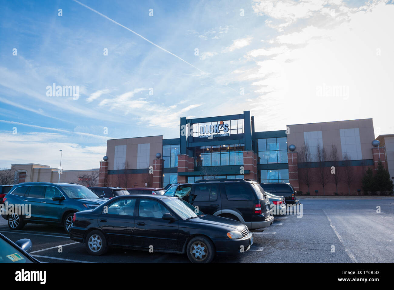 STERLING, VIRGINIA / USA - January 31, 2018: A section of Dulles Town Center showing Dicks Sporting Goods Store and outside parking lot Stock Photo