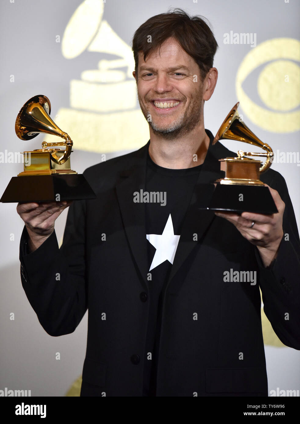 Donny McCaslin appears backstage with his awards for Best Engineered