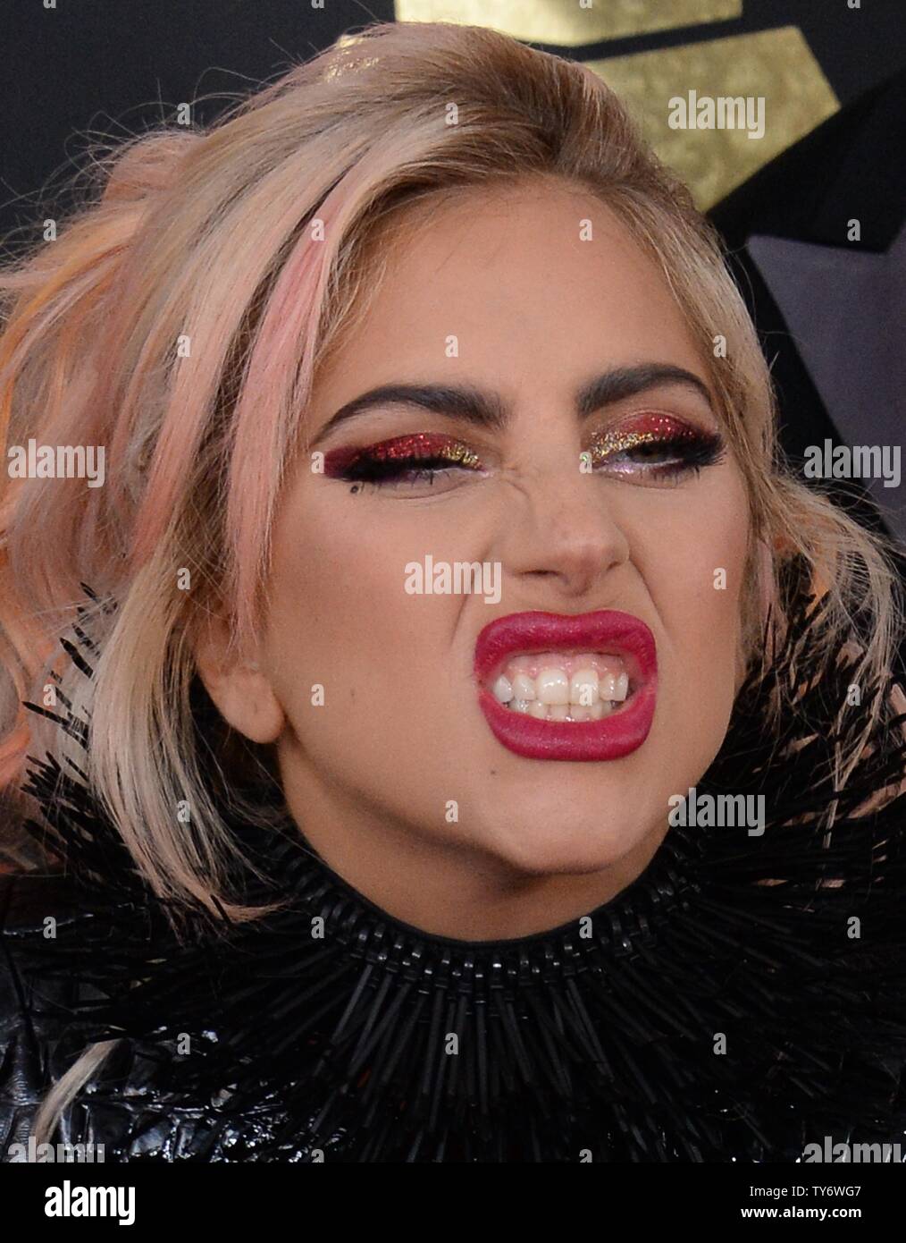 Singer Lady Gaga arrives for the 59th annual Grammy Awards held at ...