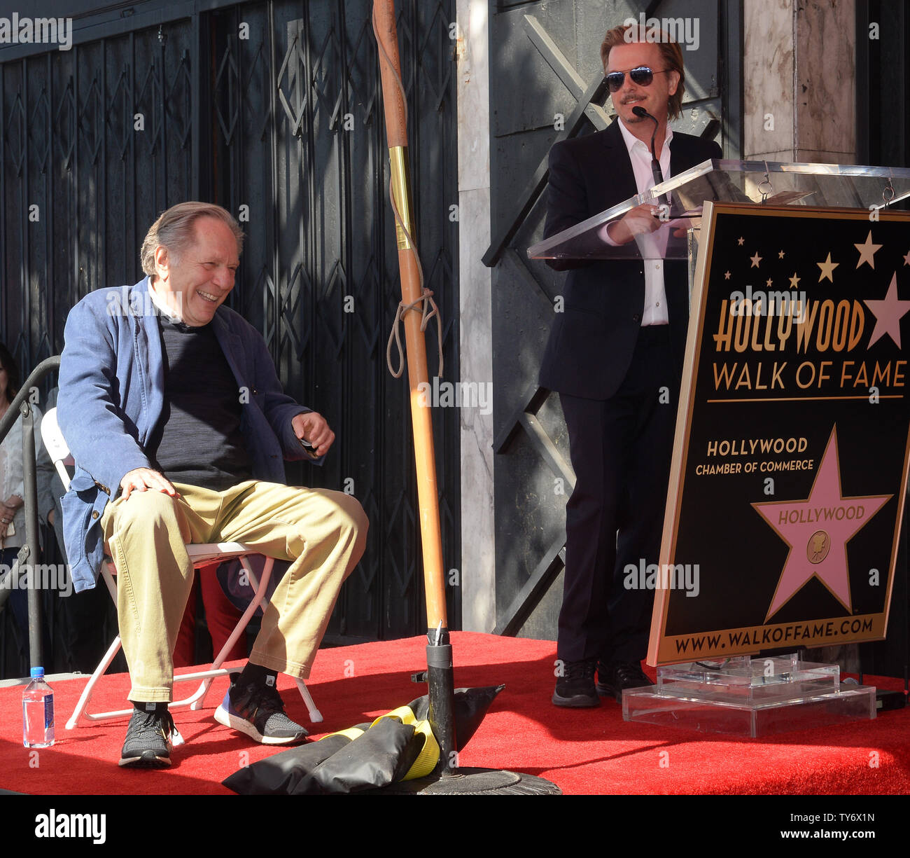 Actor George Segal (L) reacts to comments by actor David Spade during a ceremony honoring him with the 2,062nd star on the Hollywood Walk of Fame in Los Angeles on February 14, 2017. Photo by Jim Ruymen/UPI Stock Photo