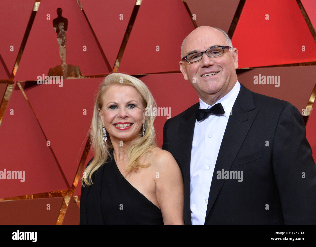 Producer Howard Barish (L) and Suzanne Barish arrive on the red carpet