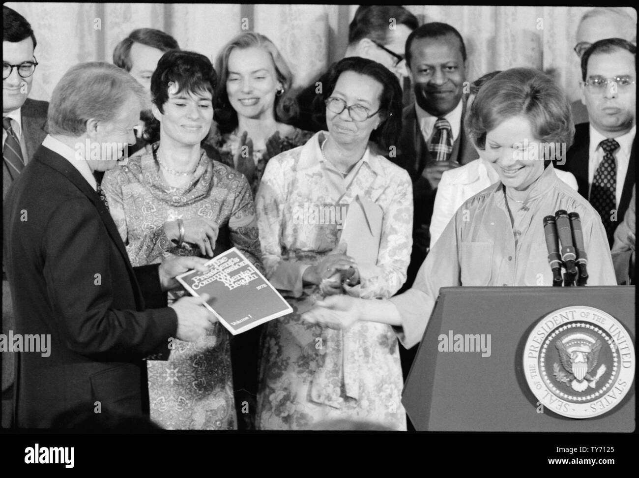 Jimmy Carter receives the Final Report of the President's Commission on Mental Health from