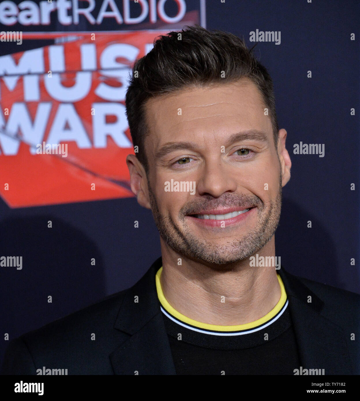 Ryan's Roses Host Ryan Seacrest attends the iHeartRadio Music Awards at The Forum in ...