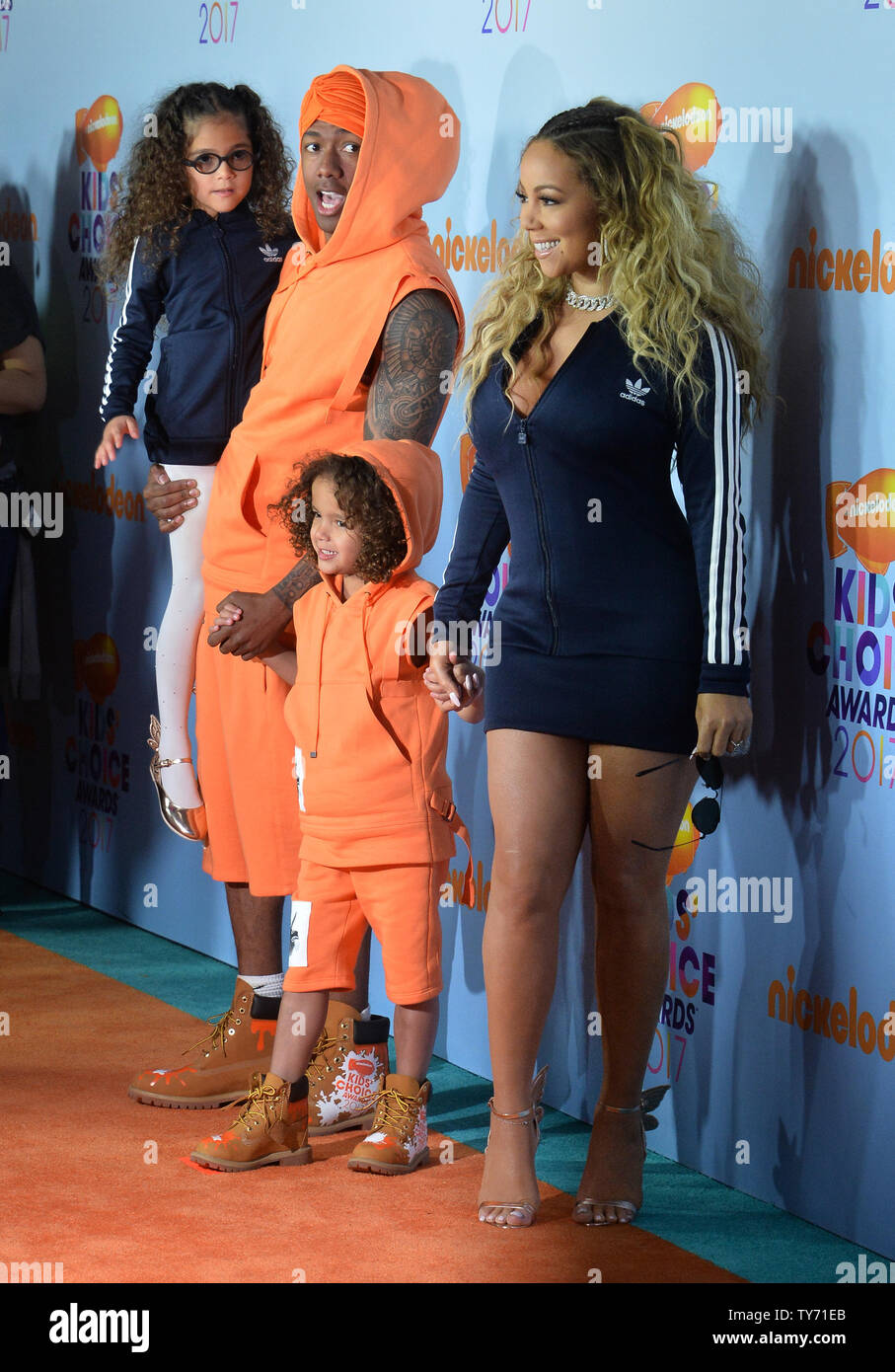 TV personality Nick Cannon and singer Mariah Carey and their twin