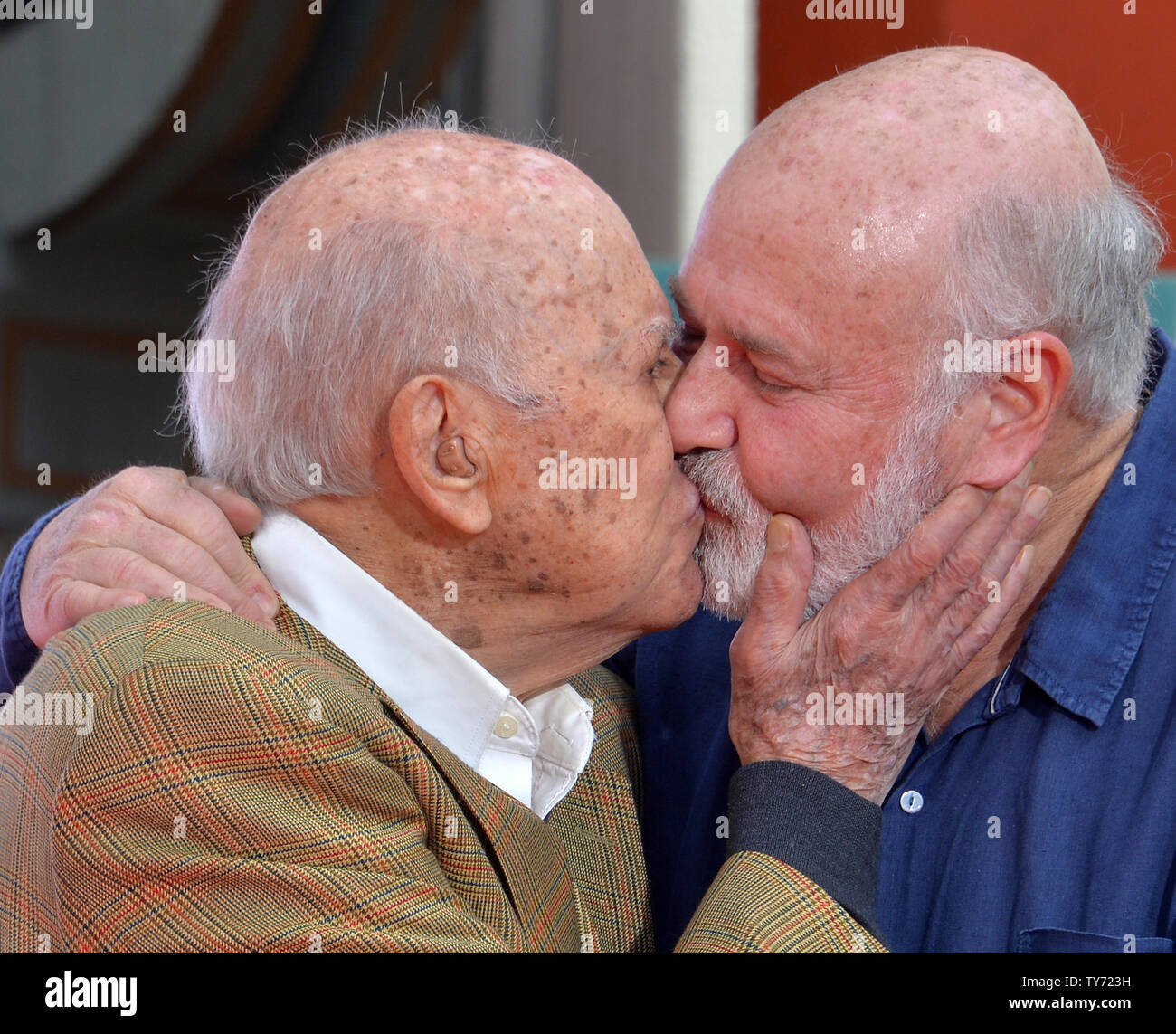 Actors and directors Carl Reiner (L) and Rob Reiner participate in a father and son double hand and footprint ceremony immortalizing them in the forecourt of TCL Chinese Theatre (formerly Grauman's) in the Hollywood section of Los Angeles on April 7, 2017. Photo by Jim Ruymen/UPI Stock Photo