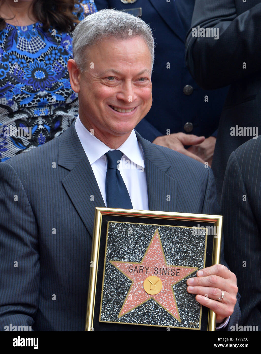 Actor and director Gary Sinise is joined by his wife Moira Harris during an  unveiling ceremony honoring him with the 2,606th star on the Hollywood Walk  of Fame in Los Angeles on