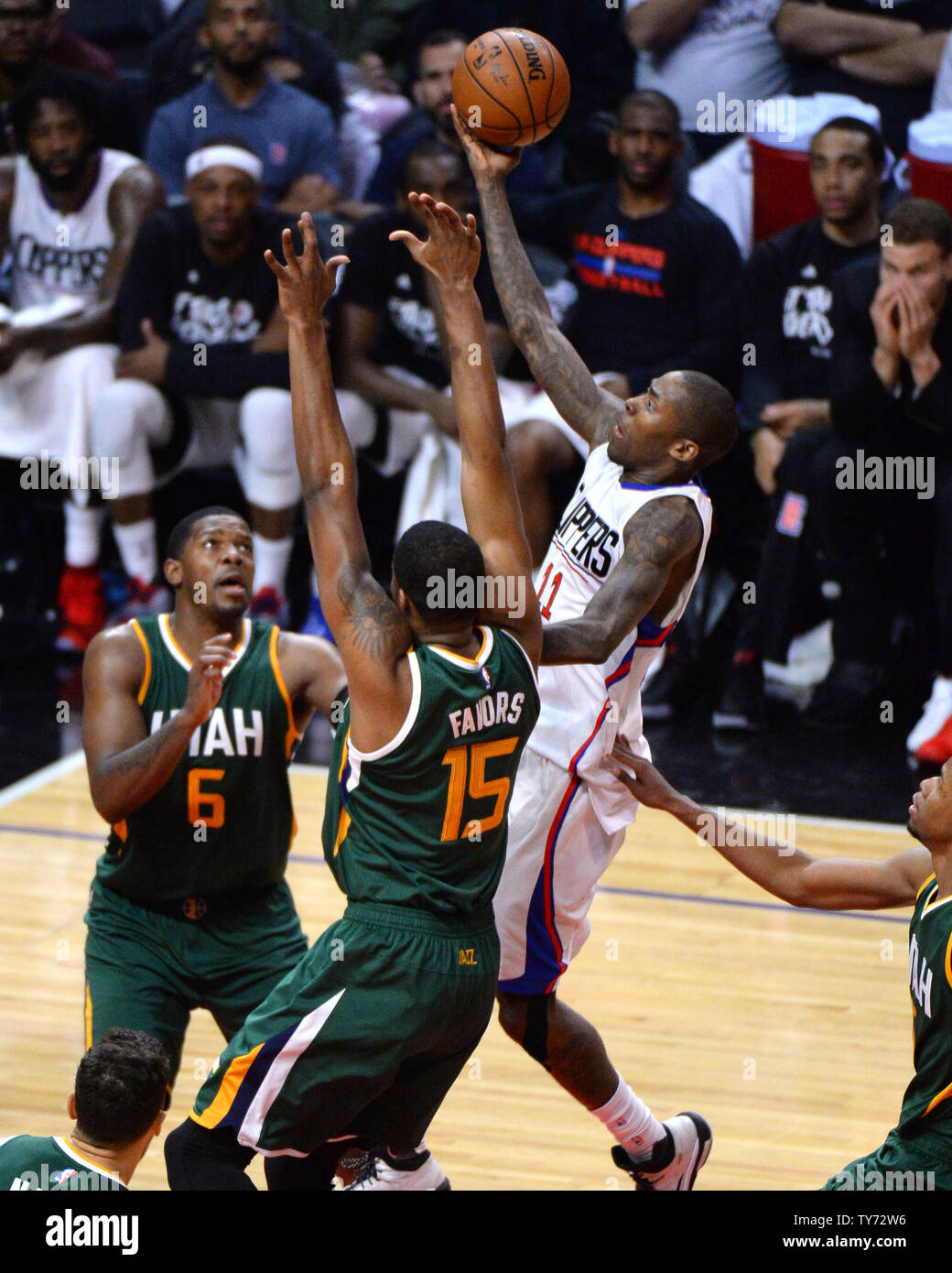 Clippers' guard Jamal Crawford shoots over Jazz forward Derrick Favors (15) in game 5 of their best-of seven Western Conference playoff series  at Staples Center in Los Angeles on April 25, 2017.  Photo by Jon SooHoo/UPI Stock Photo