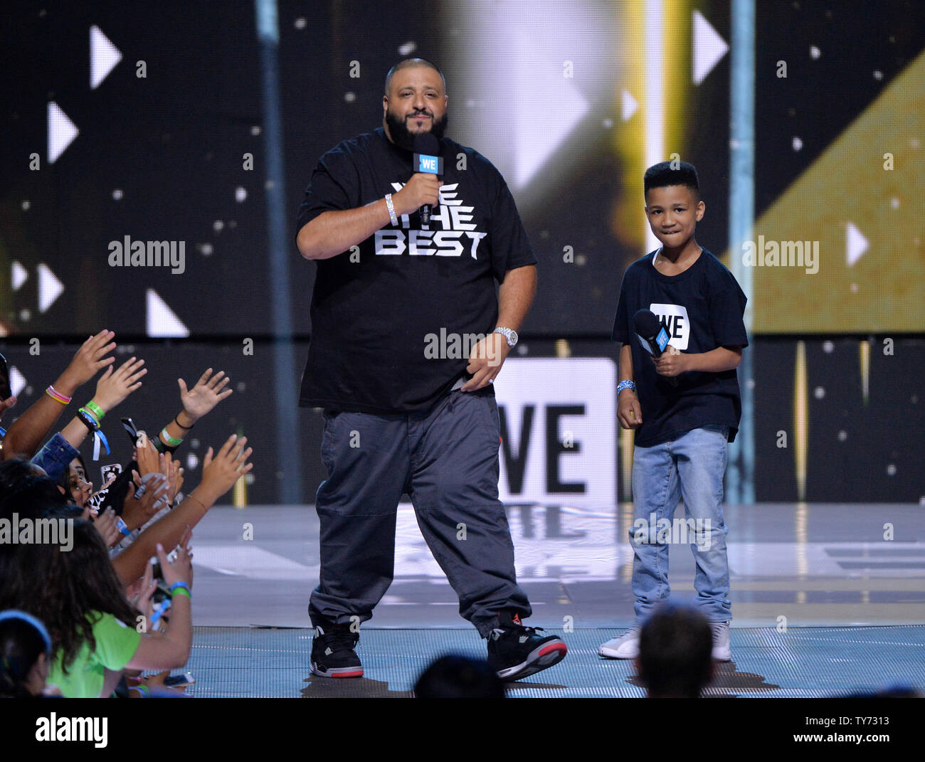 DJ Khaled and Demarjay Smith appear onstage during We Day