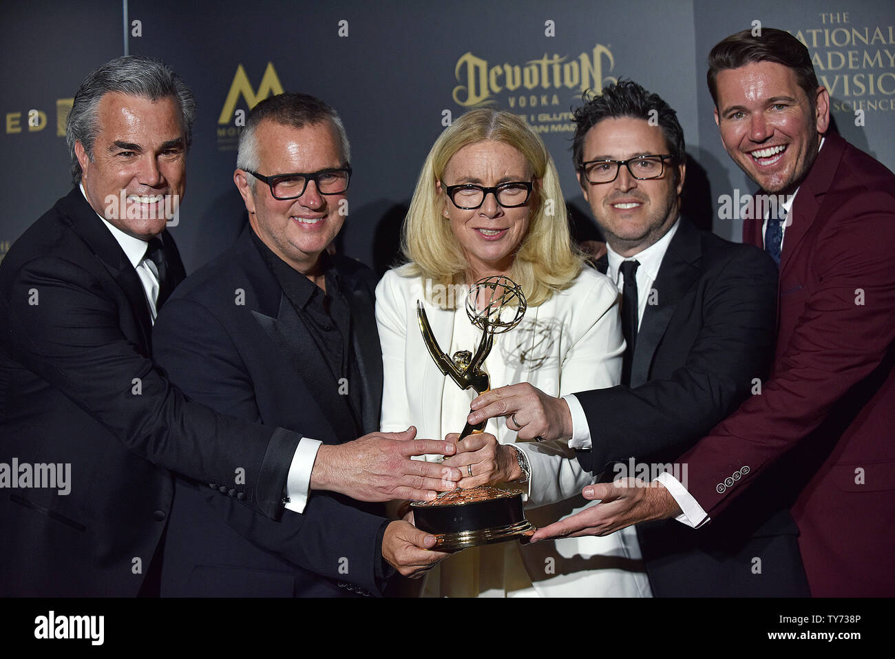 Andy Lassner, Jonathan Norman, Mary Connelly, Ed Glavin and Kevin Leman  from 'The Ellen Degeneres Show' hold their Daytime Emmy for Outstanding  Entertainment Talk Show in the press room during the 44th