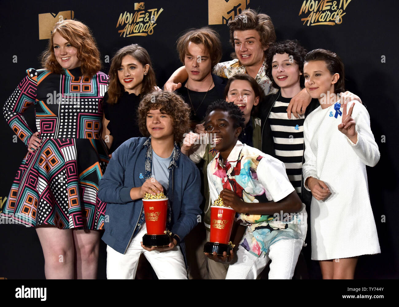 Cast of 'Stranger Things' appear backstage with the Show Of The Year award  for 'Stranger Things' during the MTV Movie & TV Awards at the Shrine  Auditorium in Los Angeles on May
