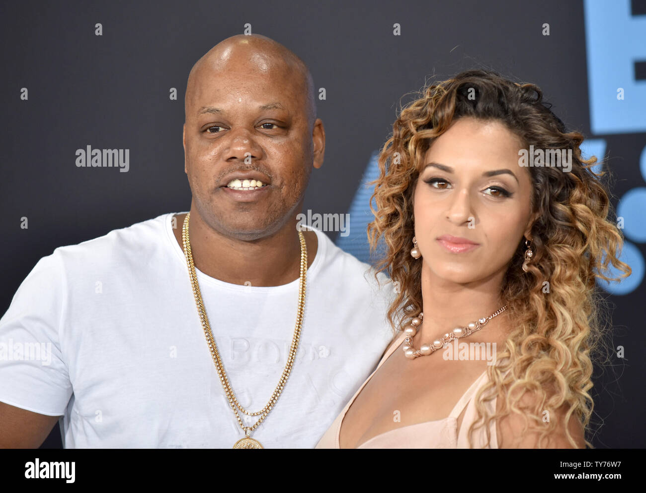 Rapper Too Short (L) and guest attend the 17th annual BET Awards at  Microsoft Theater in Los Angeles on June 25, 2017. The ceremony celebrates  achievements in entertainment and honors music, sports