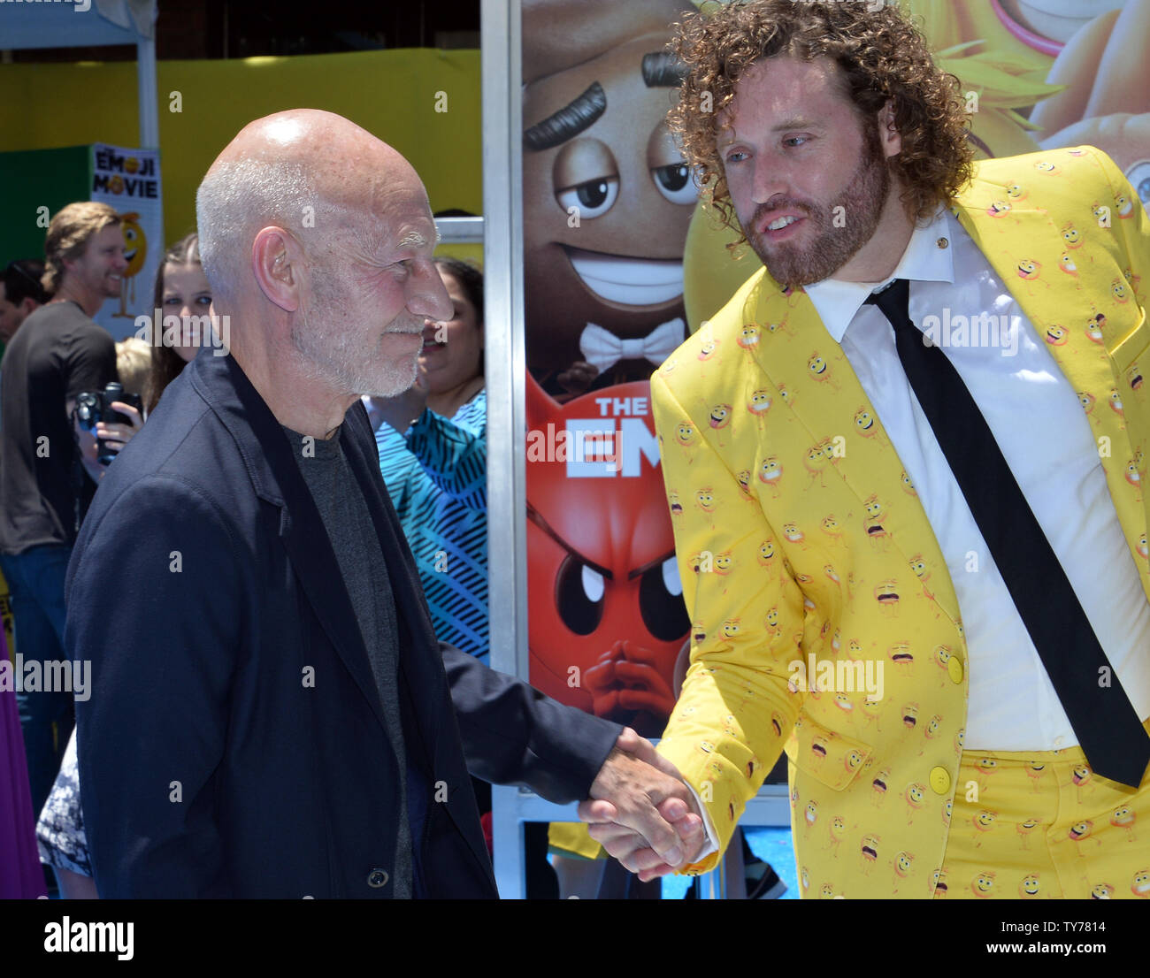 Cast members Patrick Stewart, (L) and T.J. Miller, the voices of Poop
