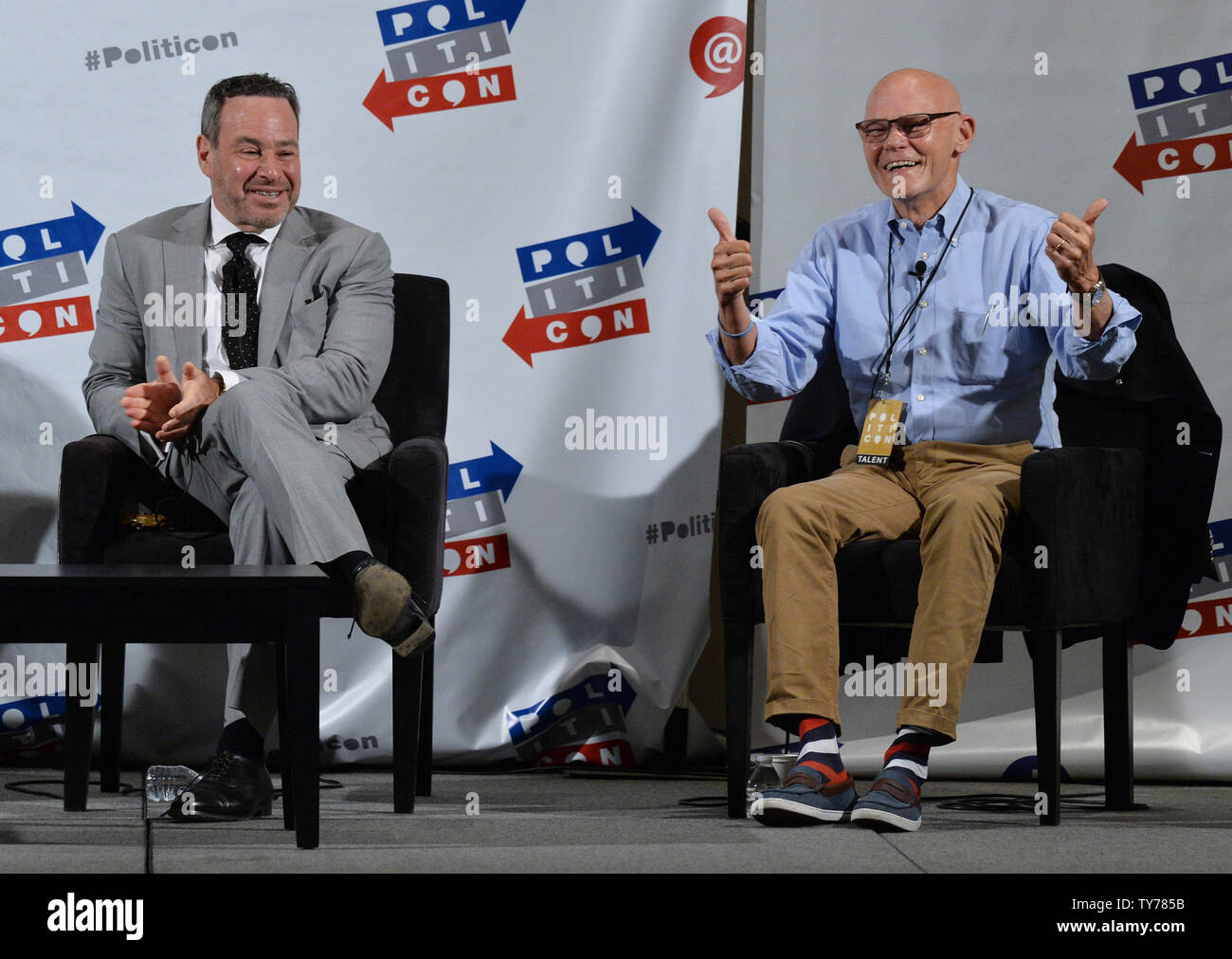 David From (L) and James Carville participate in the Art of the