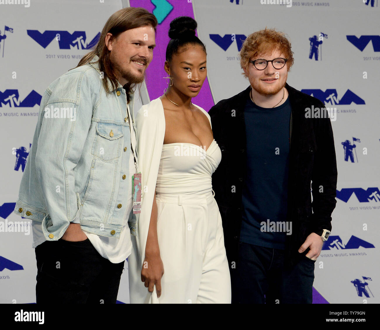 Jennie Pegouskie and Ed Sheeran (R) arrive for the 34th annual MTV