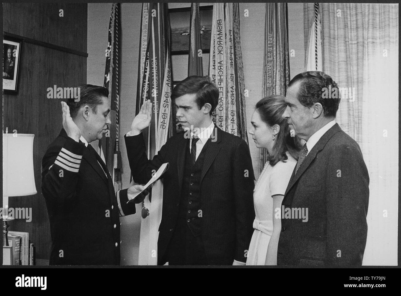 Joining the Navy; Scope and content:  Pictured: Unidentified man, David and Julie Eisenhower, President Nixon. Subject: David Eisenhower. Stock Photo