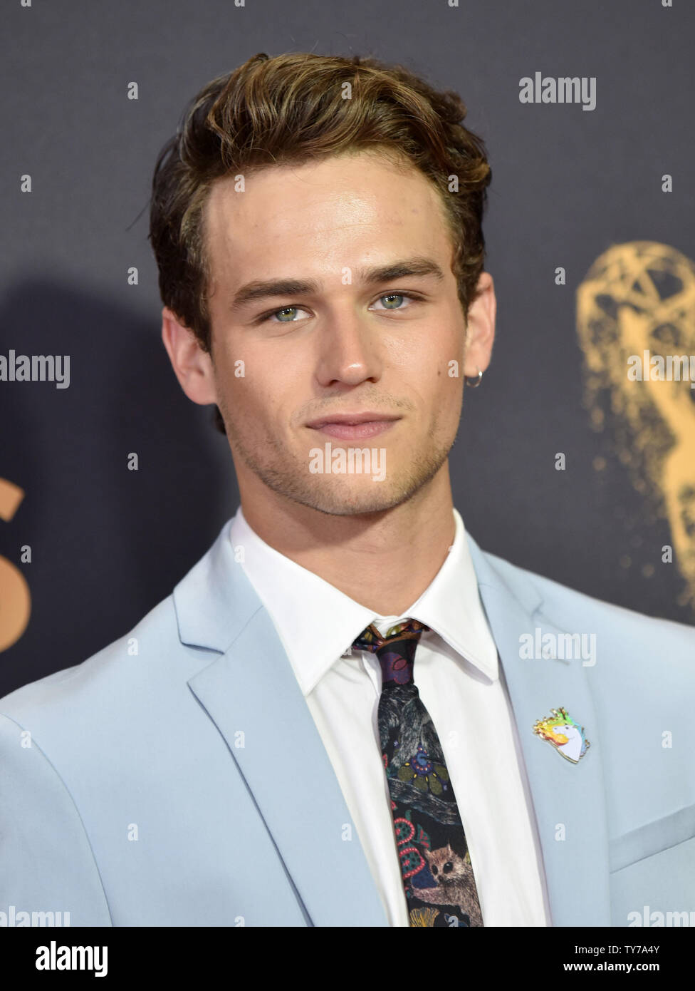 Actor Brandon Flynn arrives for the 69th annual Primetime Emmy Awards