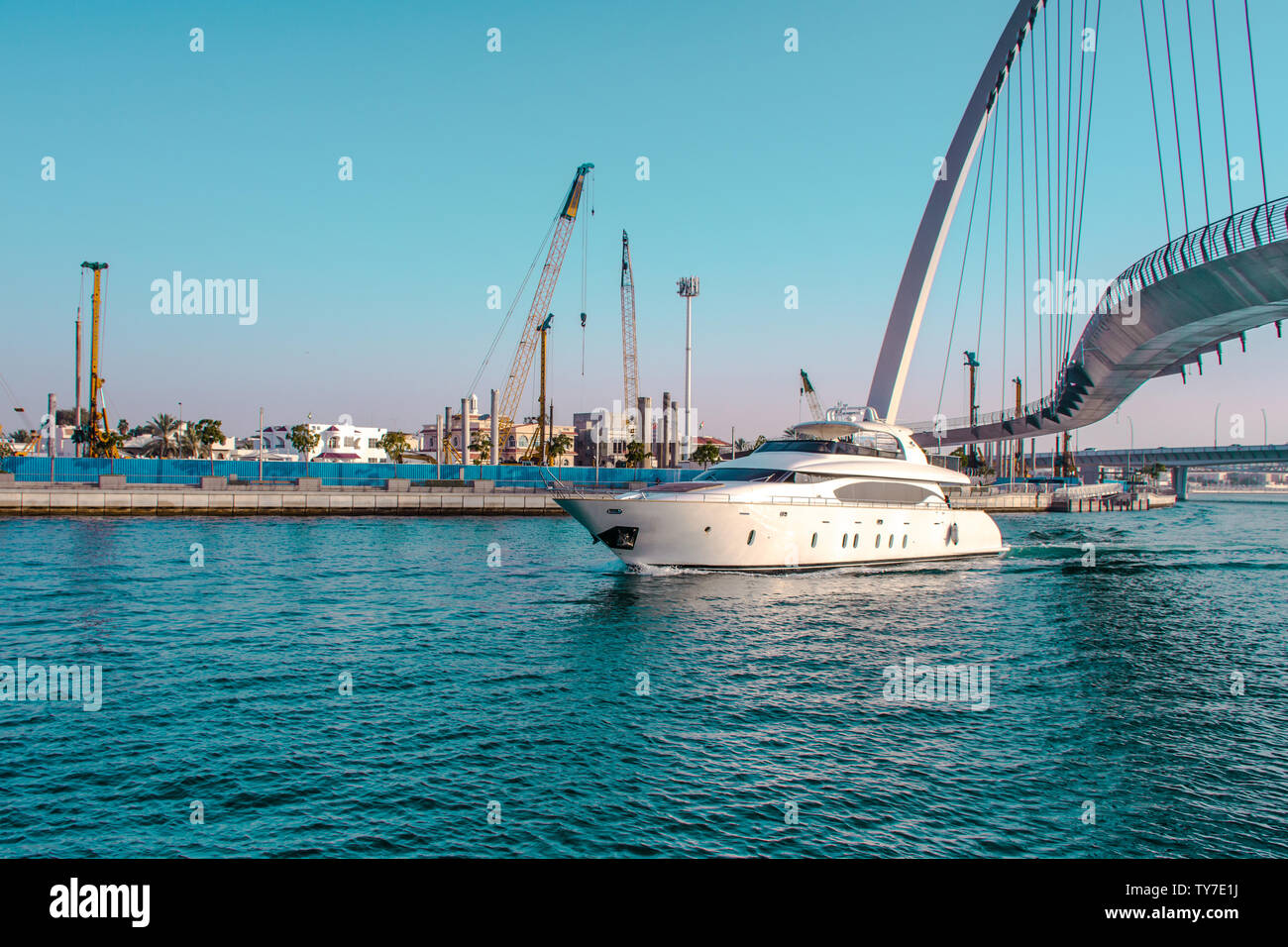Yacht ride from Dubai water canal famous tourist attraction tolerance bridge  best place to spend holidays Stock Photo