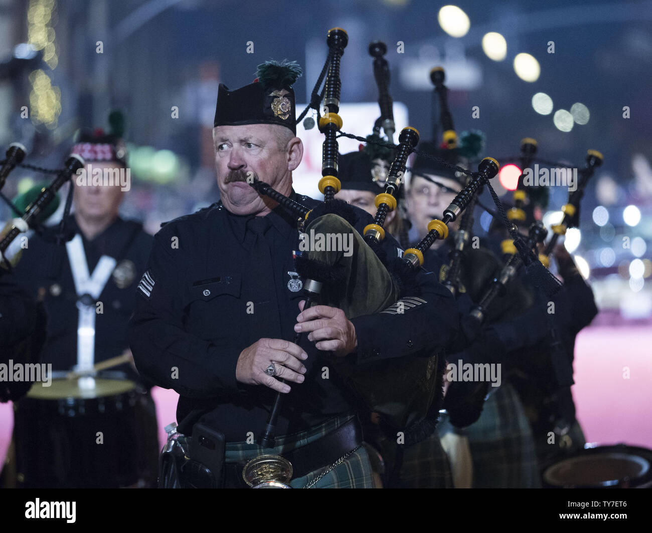 The Los Angeles Police Emerald Society Pipes and Drums are seen in the