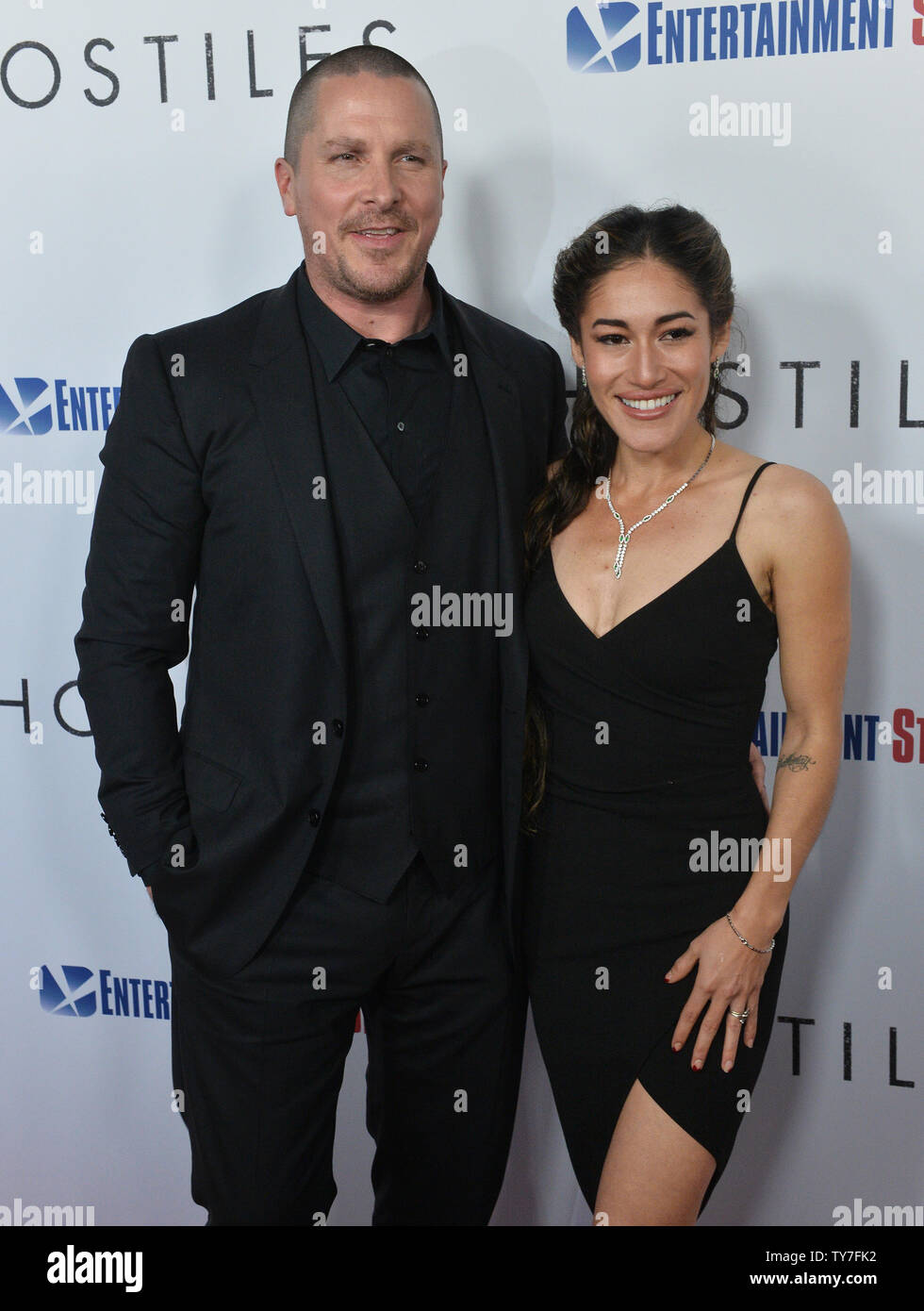 Cast Members Christian Bale And Q Orianka Kilcher Attend The Premiere Of The Motion Picture Western Hostiles At The Academy Of Motion Picture Arts Sciences In Beverly Hills California On December 14