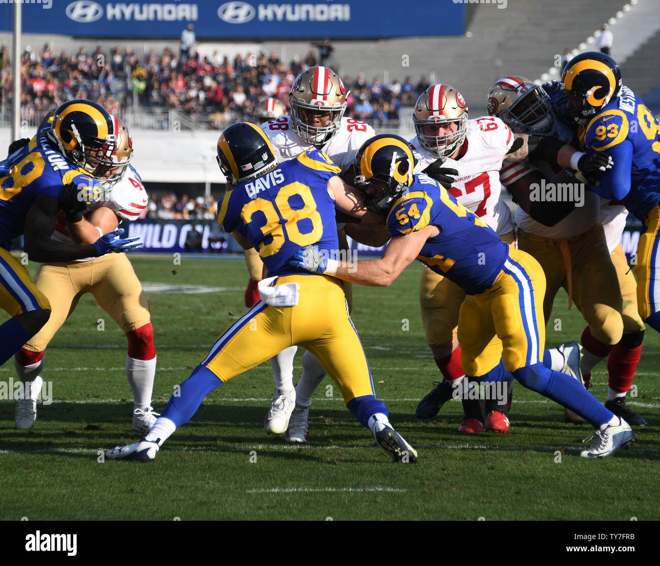 Rams embraces Niners in Los Angeles, December 31, 2017. Photo by Jon
