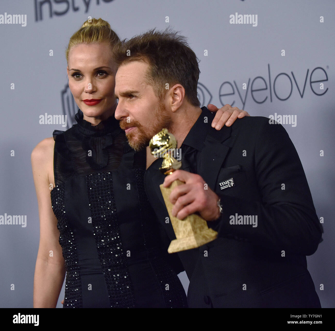 Sam Rockwell (R) and his wife Leslie Bibb attends the 19th annual