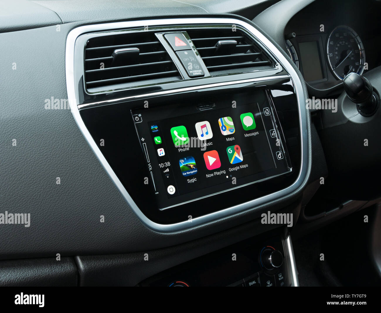 IOS 12 Apple CarPlay home screen menu on Bosch in car dashboard Satnav infotainment head unit in Suzuki S-Cross SX4 vehicle. Stock Photo